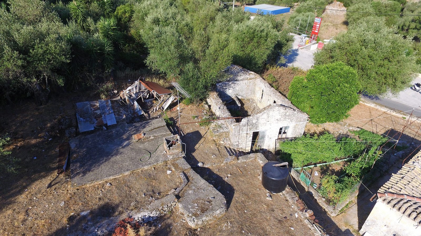 Aerial view of house and ruins for sale in Ithaca Greece
