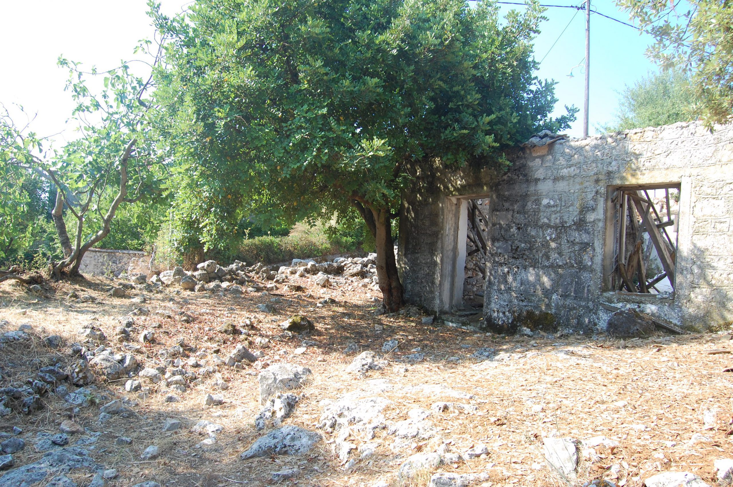 Exterior view of ruins and house for sale in Ithaca Greece