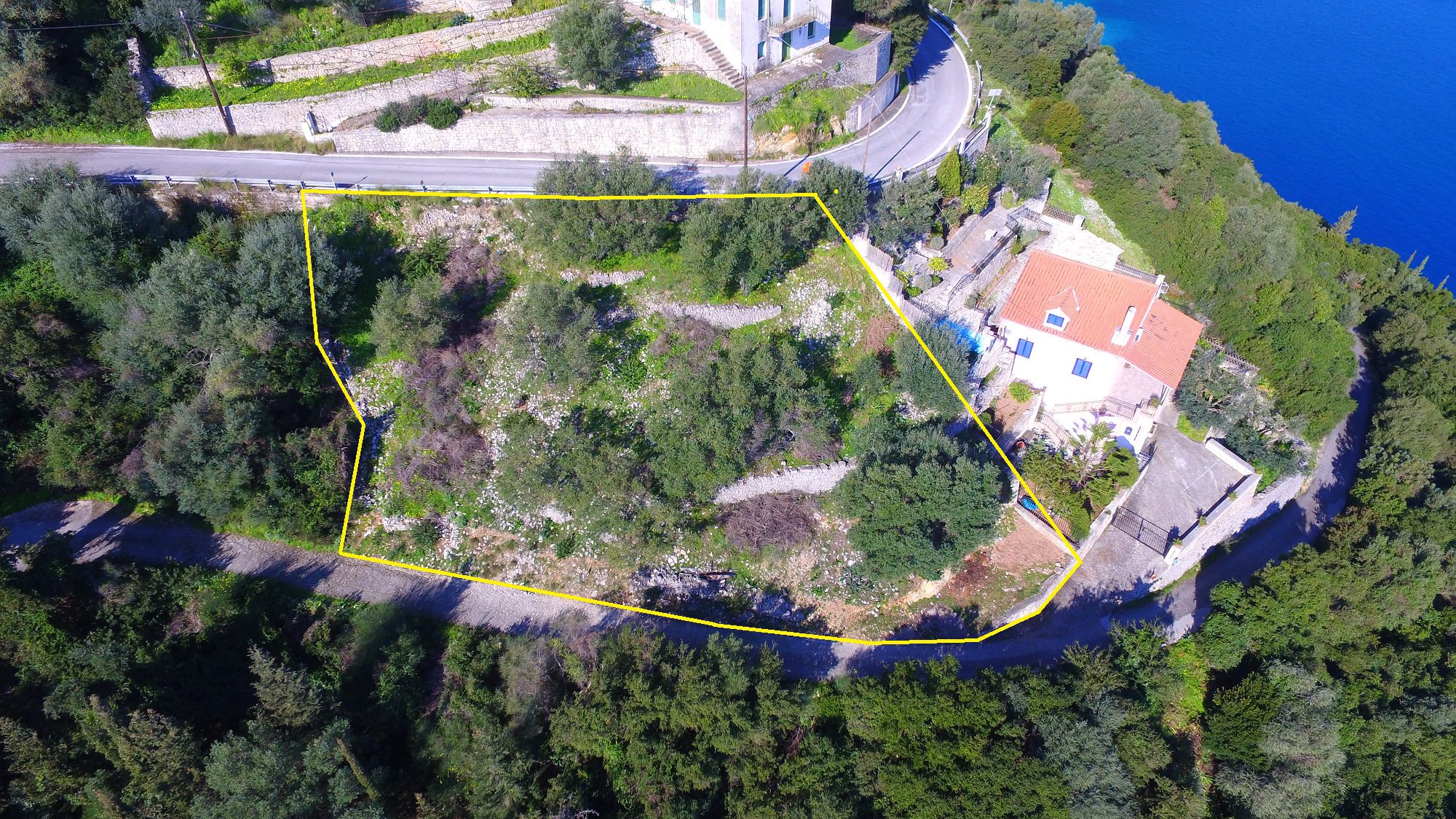 Aerial view and border of land for sale in Ithaca Greece, Kioni