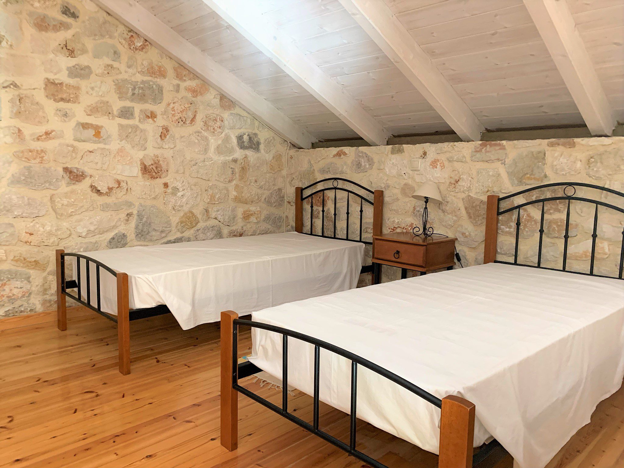 Attic bedroom of holiday houses for rent on Ithaca Greece, Stavros