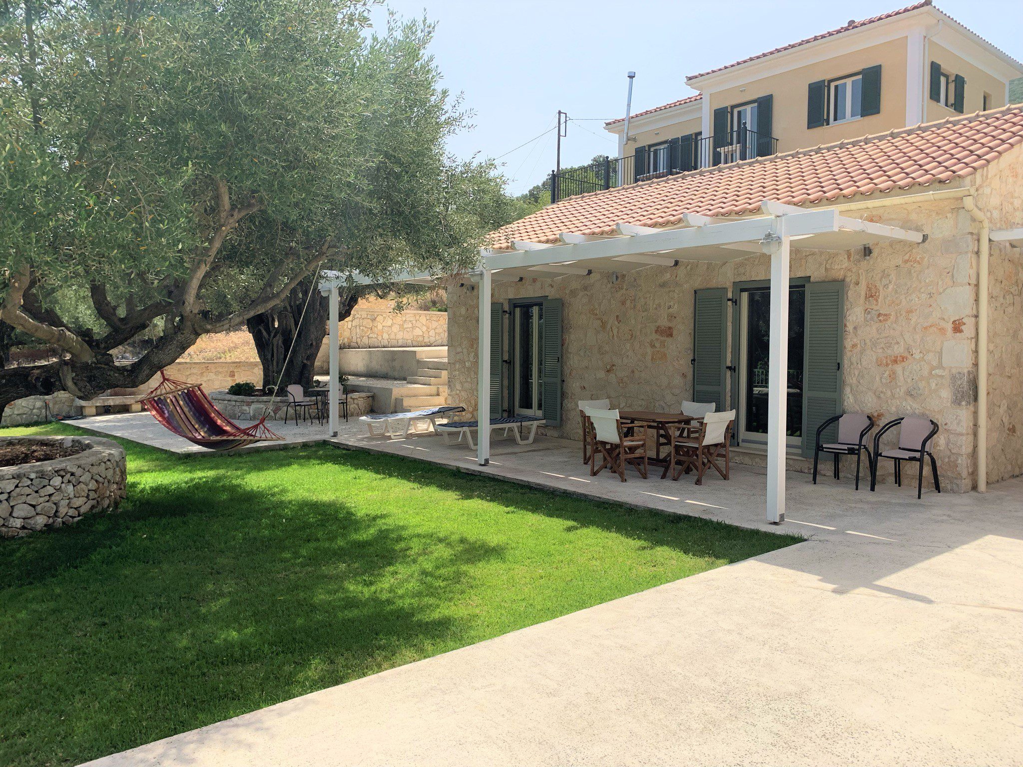 Front garden of holiday houses for rent on Ithaca Greece, Stavros