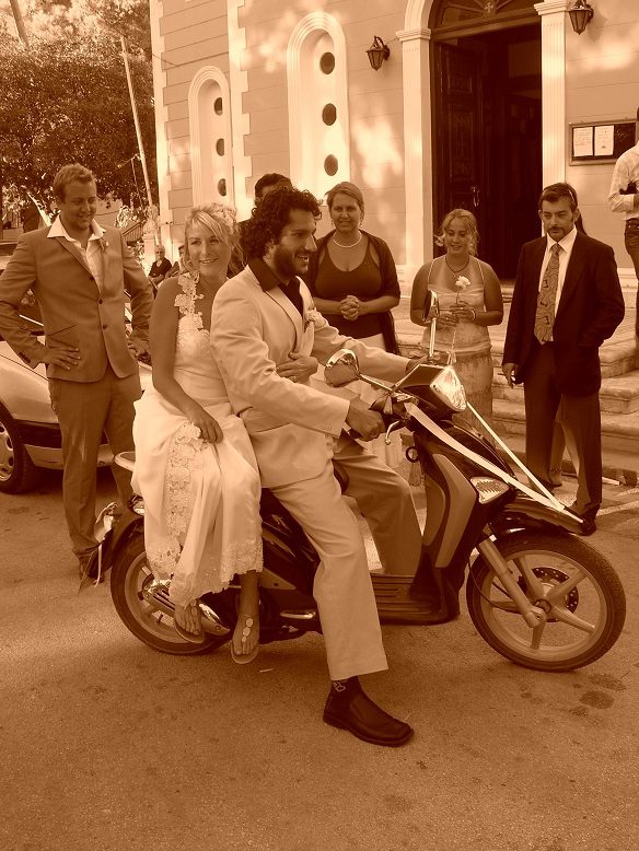Bride and groom leaving church on Ithaca Greece