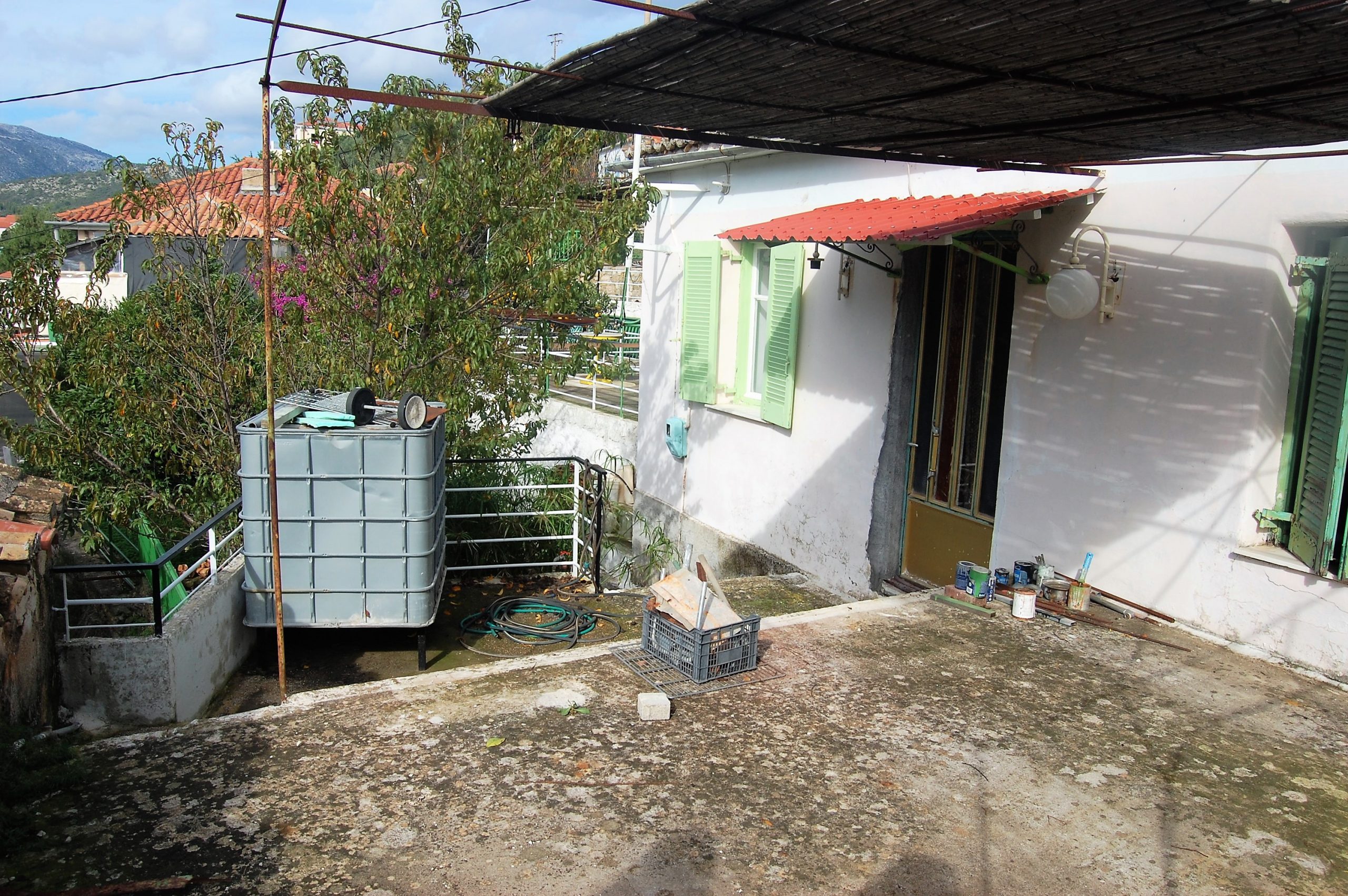 Outside terrace of house for sale in Ithaca Greece, Vathi