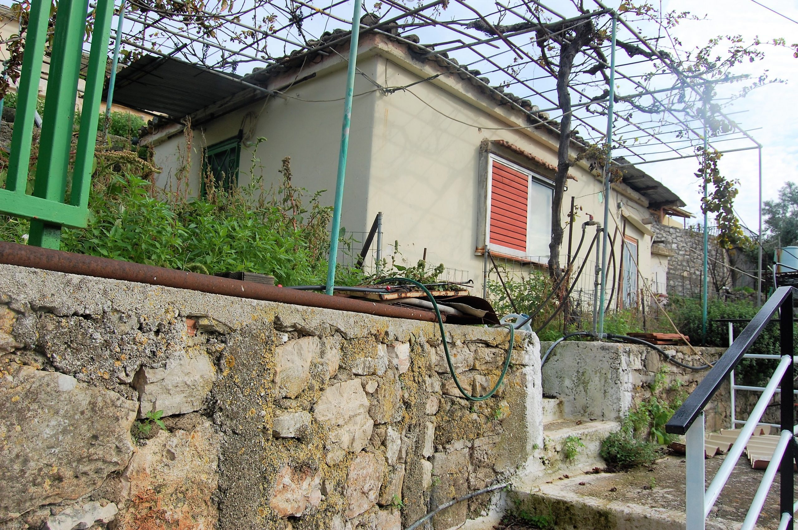Exterior facade of house for sale in Ithaca Greece Vathi