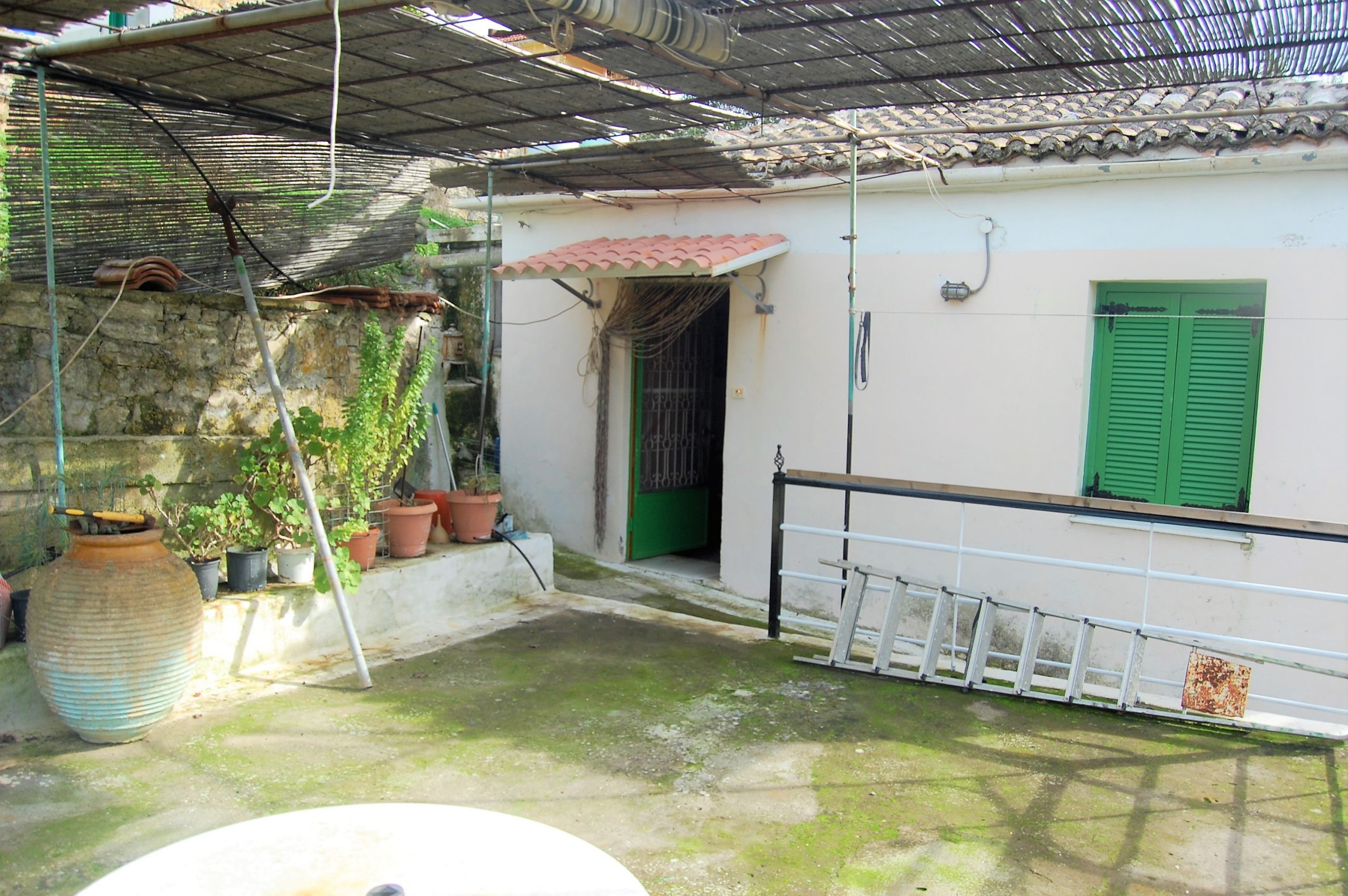 Outside terrace of house for sale in Ithaca Greece, Vathi
