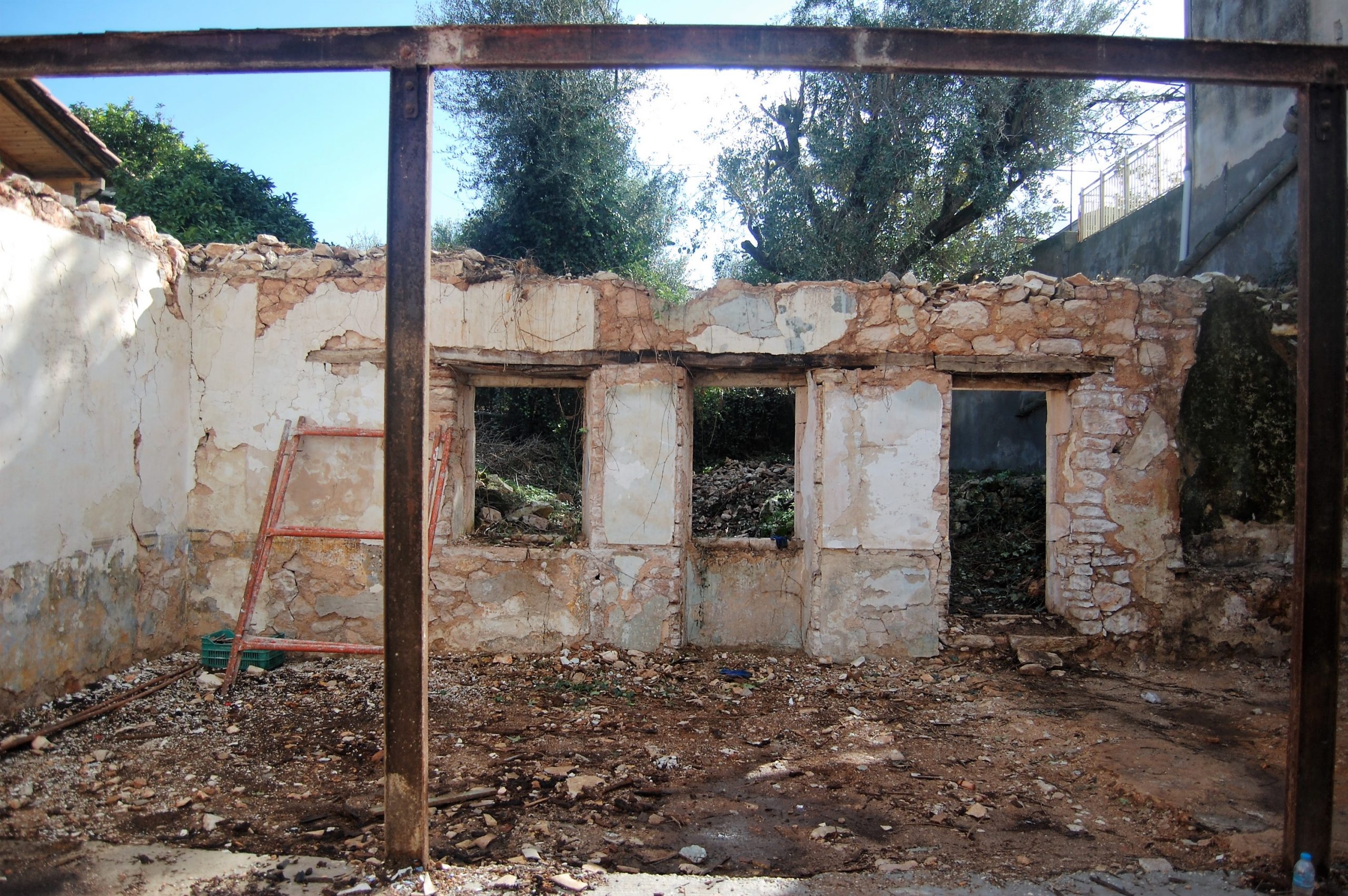 Exterior facade of ruin for sale in Ithaca Greece, Vathi