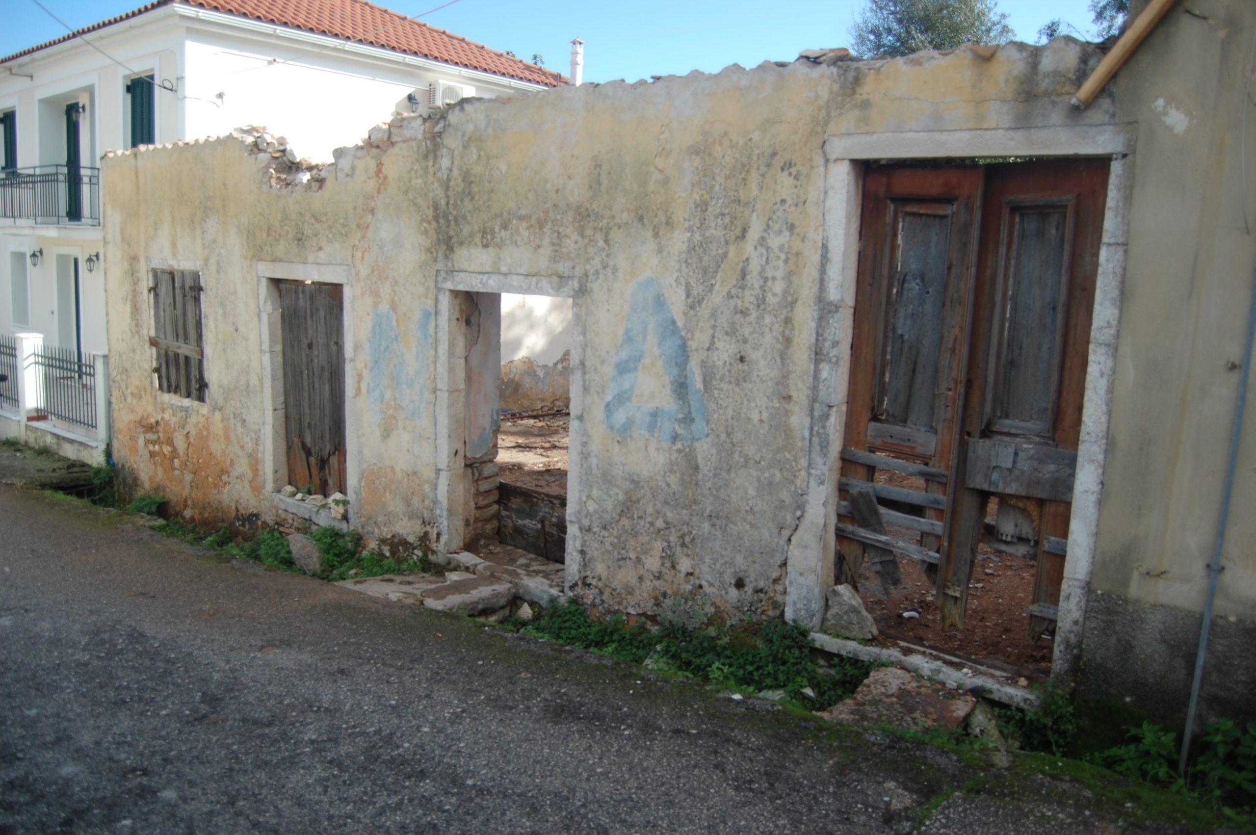 Exterior facade of ruin for sale in Ithaca Greece, Vathi