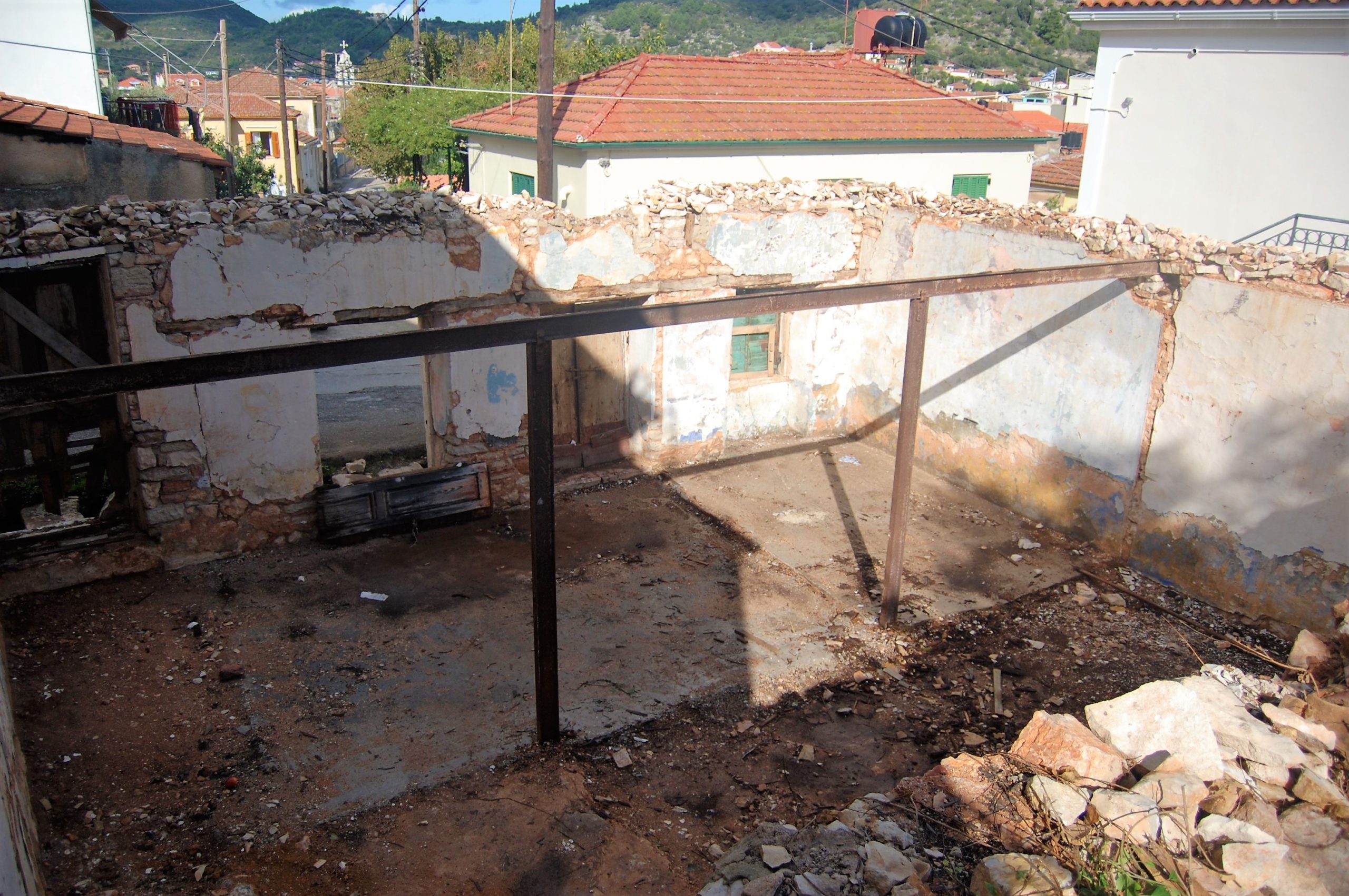 Exterior facade of ruin for sale in Ithaca Greece, Vathi