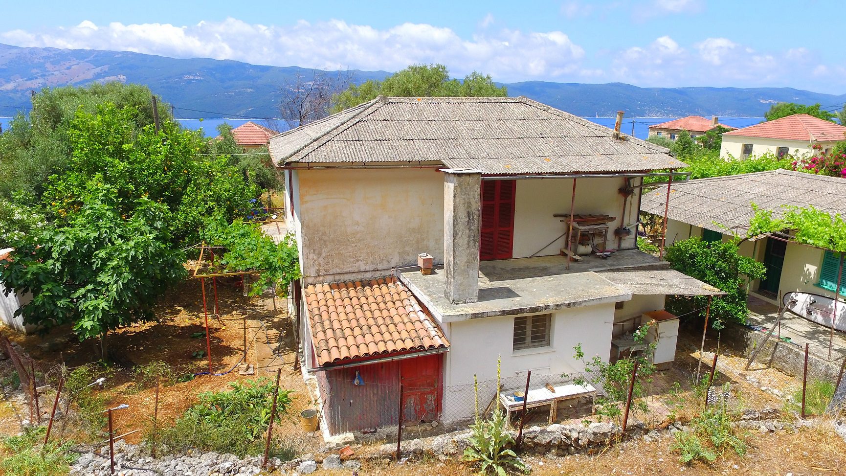 Exterior facade of house for sale in Ithaca Greece, Lefki