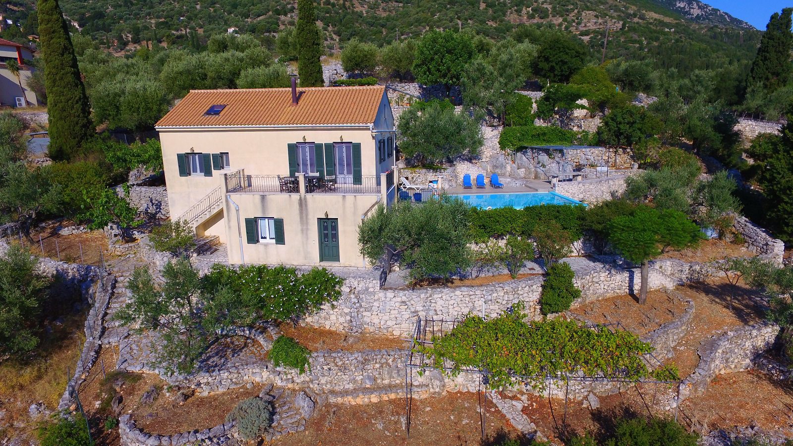 Aerial view of house with pool for sale in Ithaca Greece, Perachori