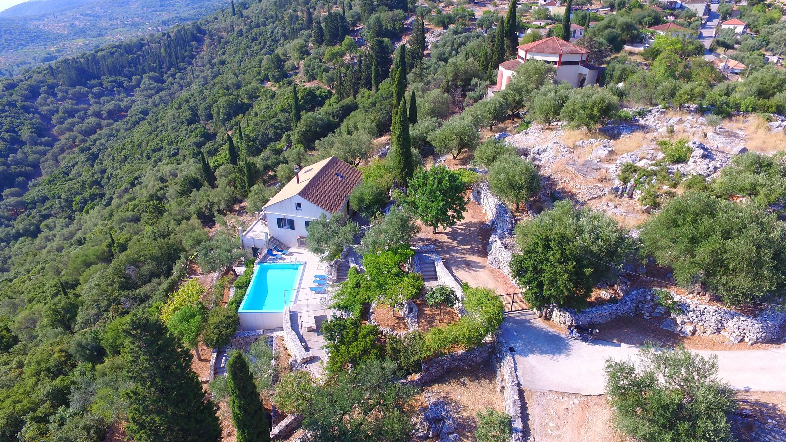 Aerial view of house with pool for sale in Ithaca Greece, Perachori