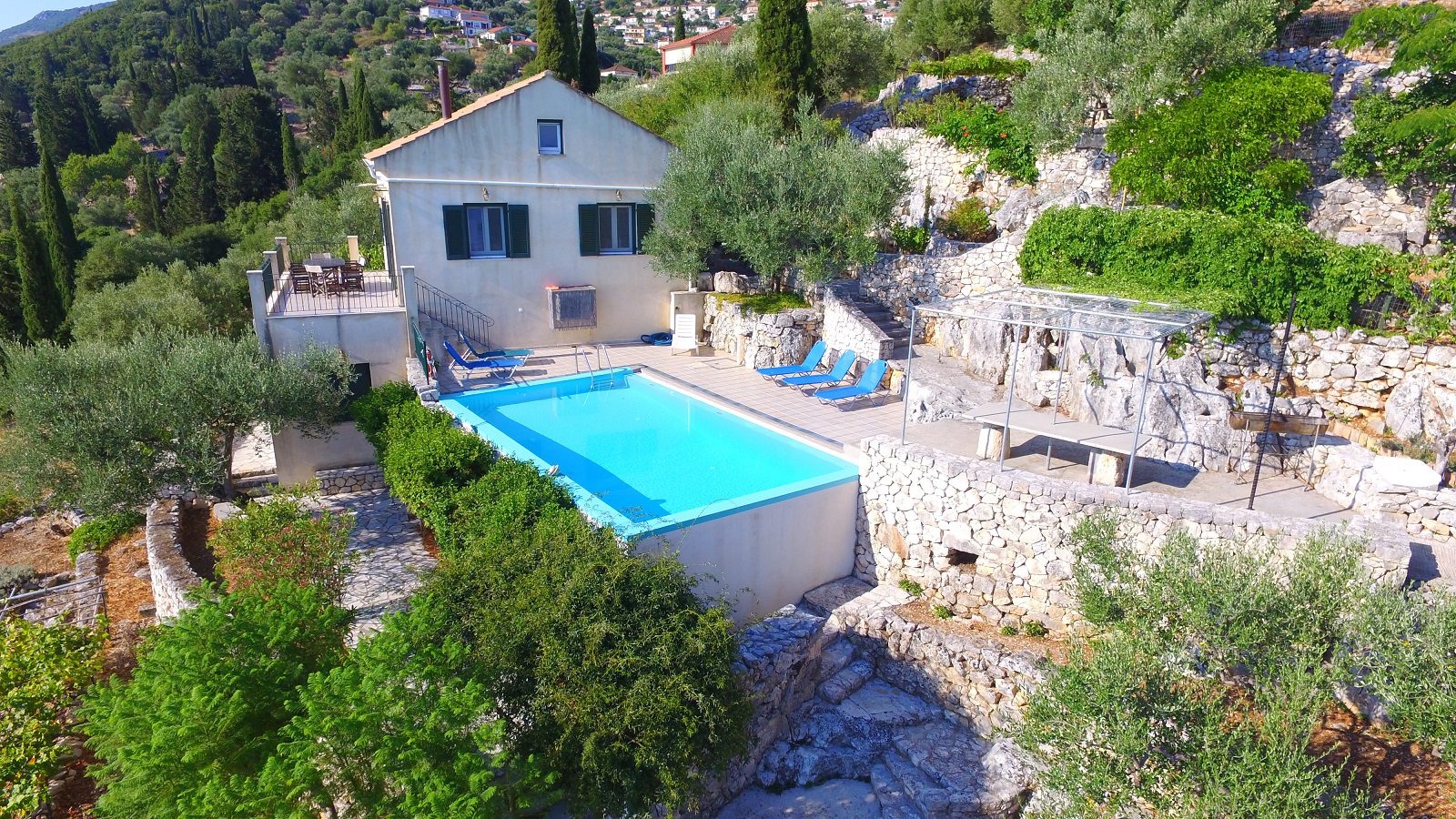 Aerial view of house with pool for sale in Ithaca Greece, Perachori