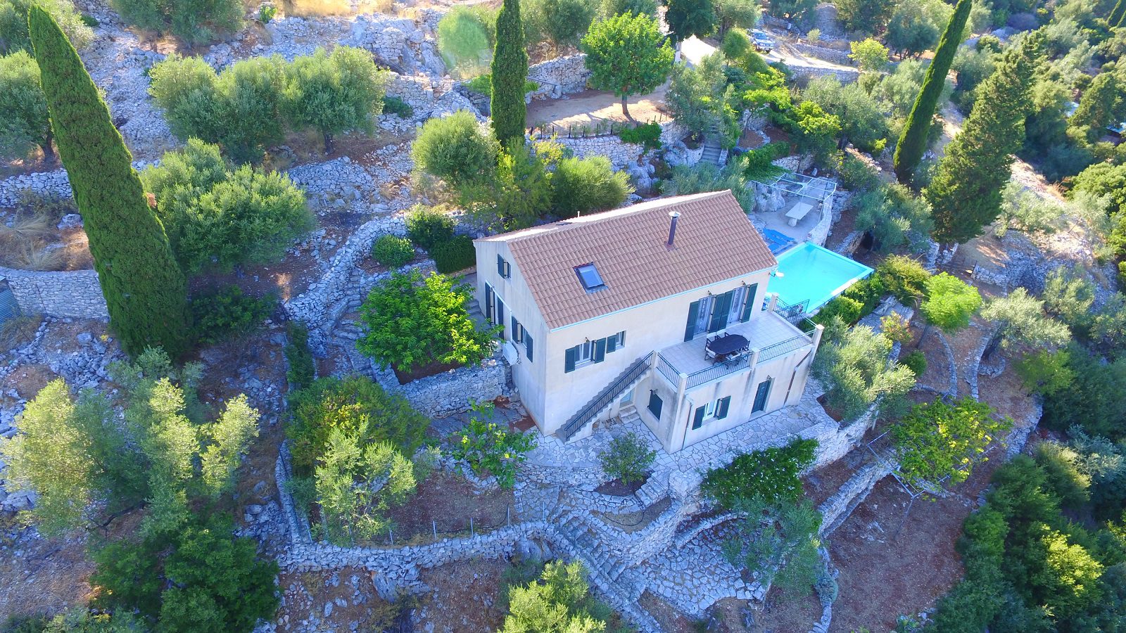 Aerial view of villa with pool for sale in Ithaca Greece, Perachori