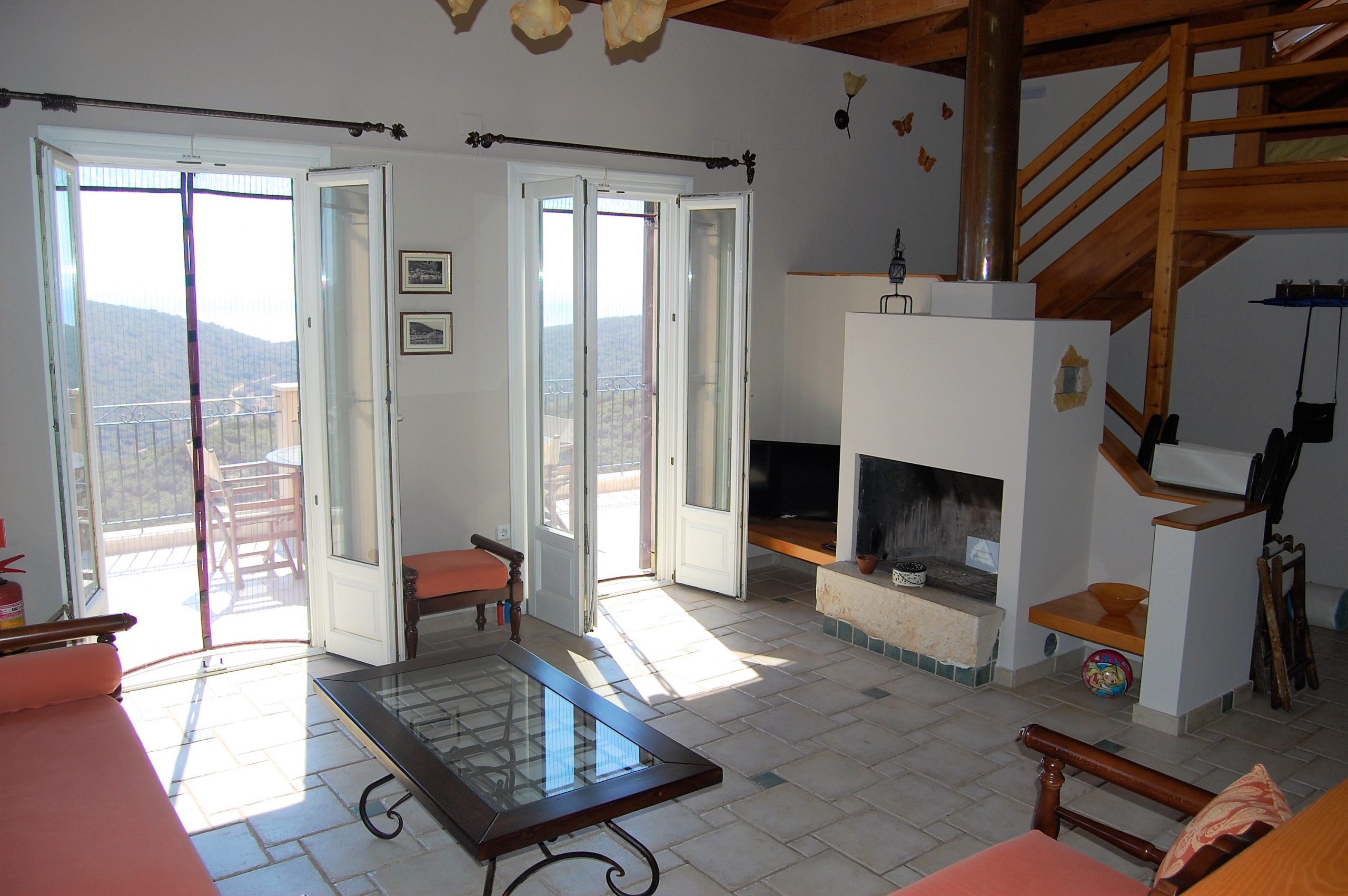 Living area with open fire place in Ithaca Greece, Perachori