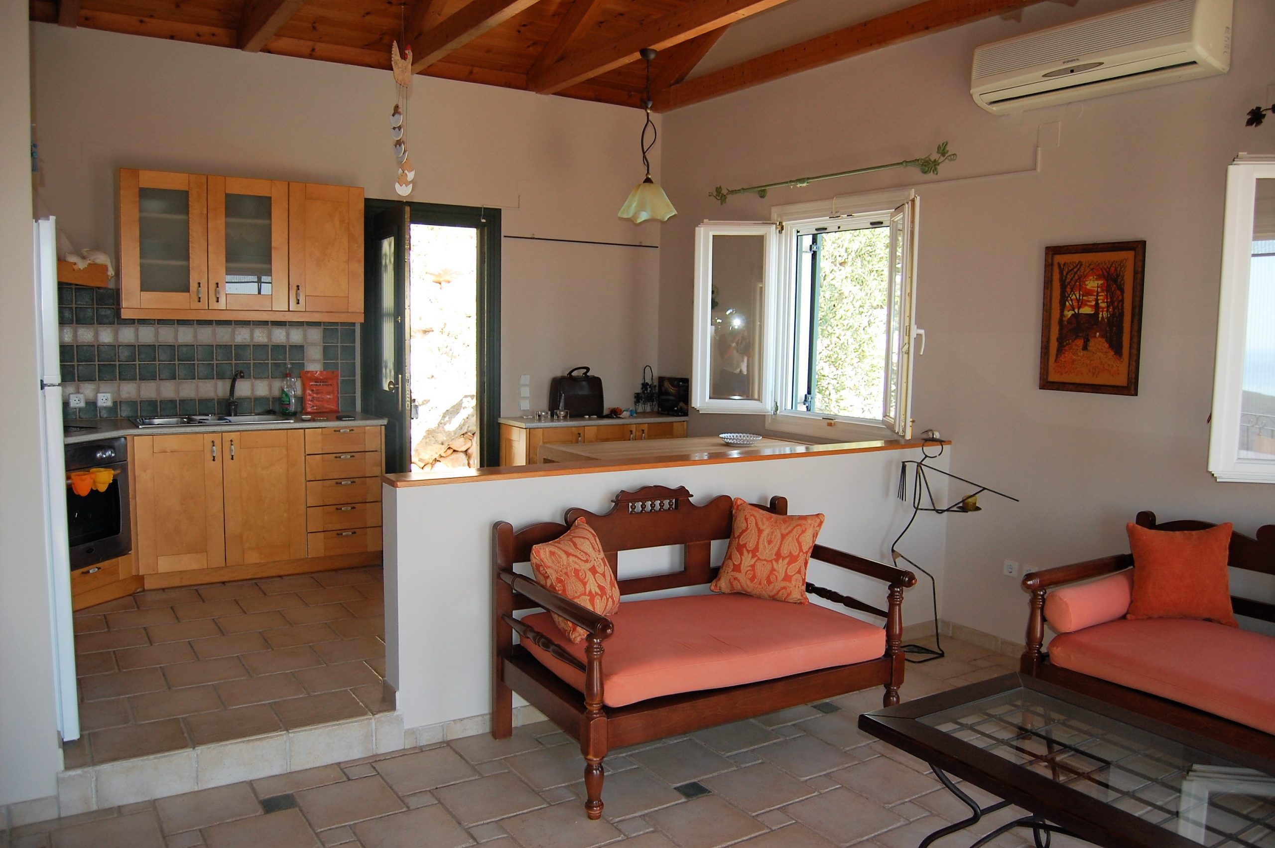 Living and kitchen area of house with pool for sale in Ithaca Greece, Perachori