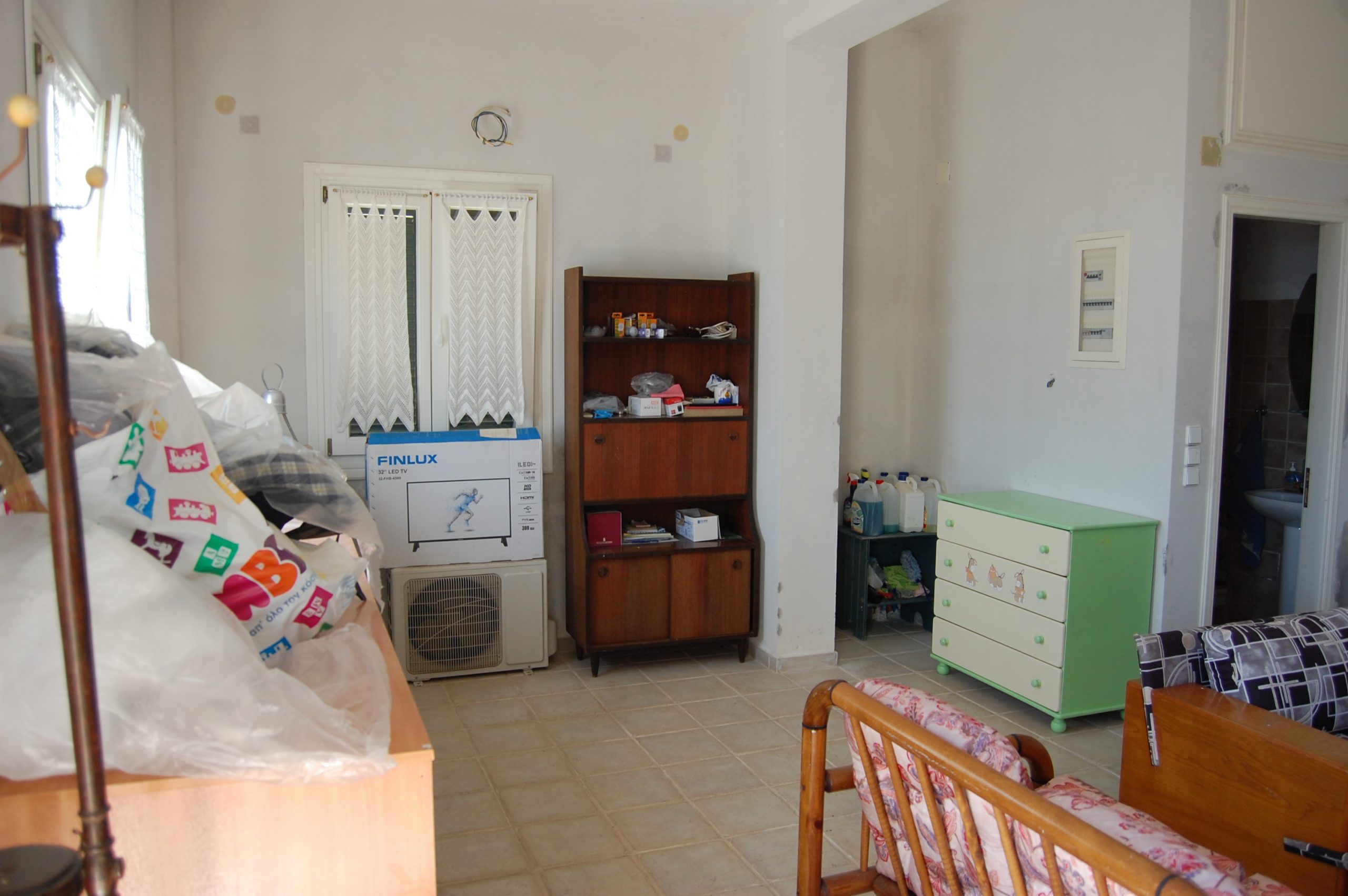 Interior of independent ground floor flat of villa with pool for sale in Ithaca Greece, Perachori