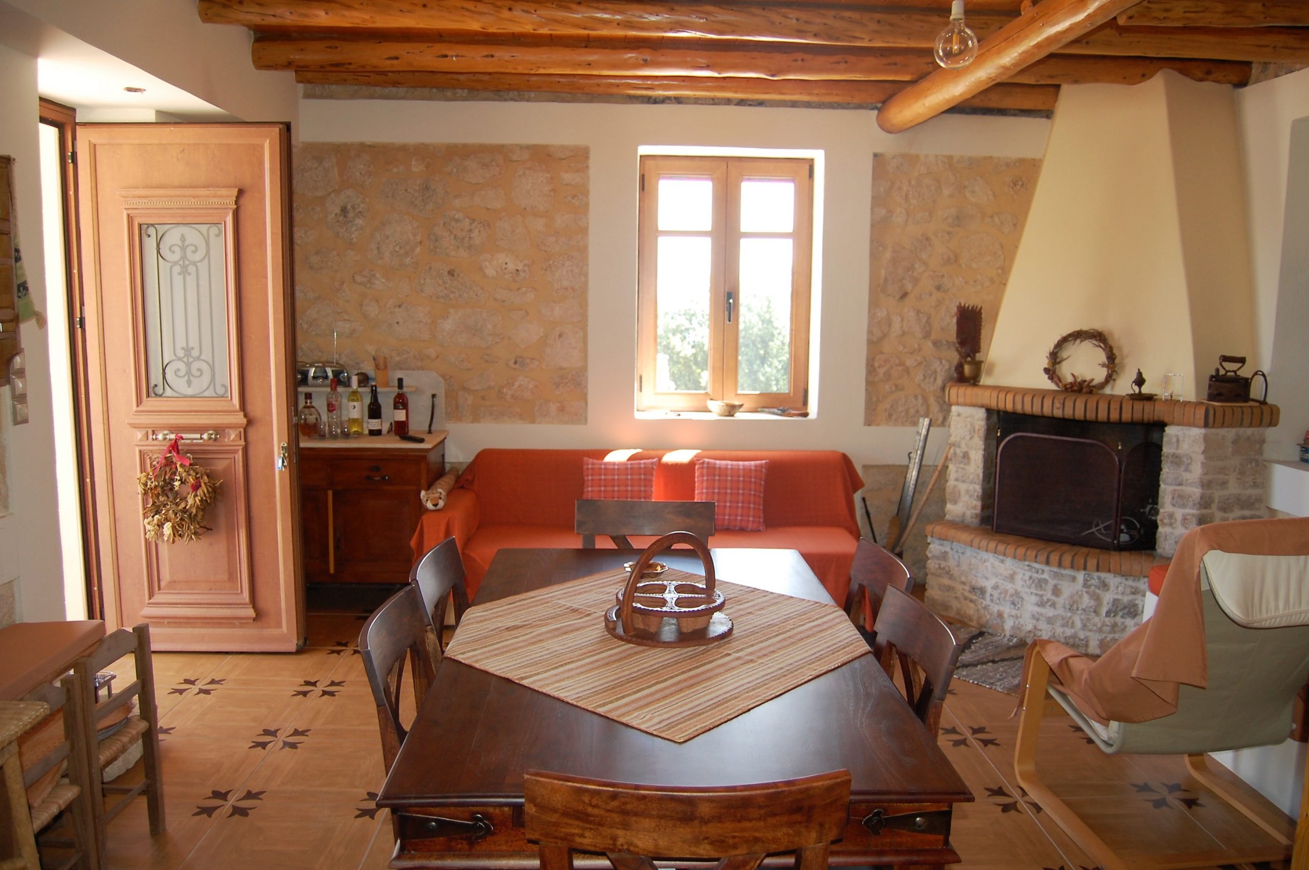 Open plan lounge of stone house for rent Ithaca Greece
