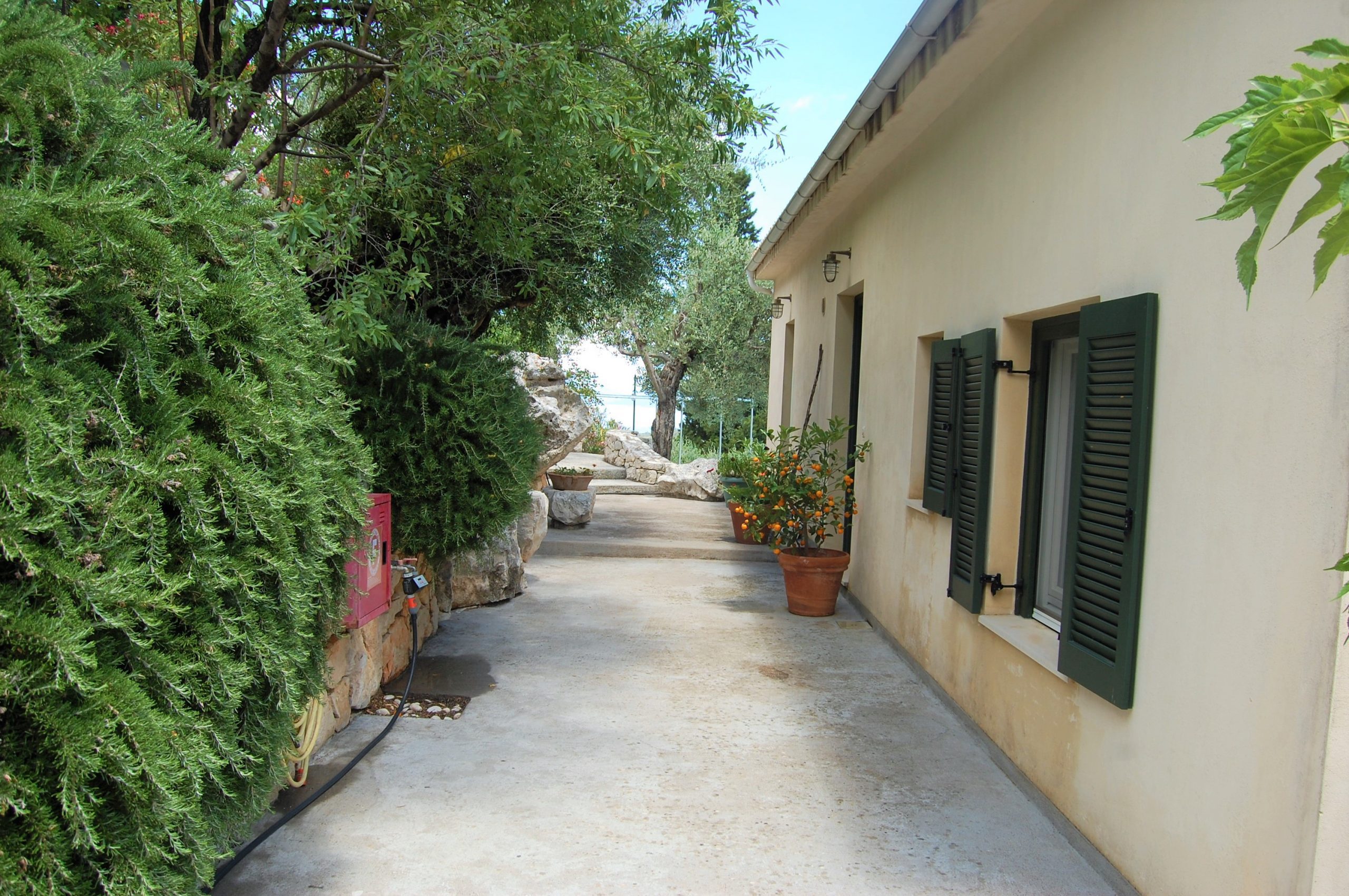 Outside area of house with pool for sale in Ithaca Greece, Perachori