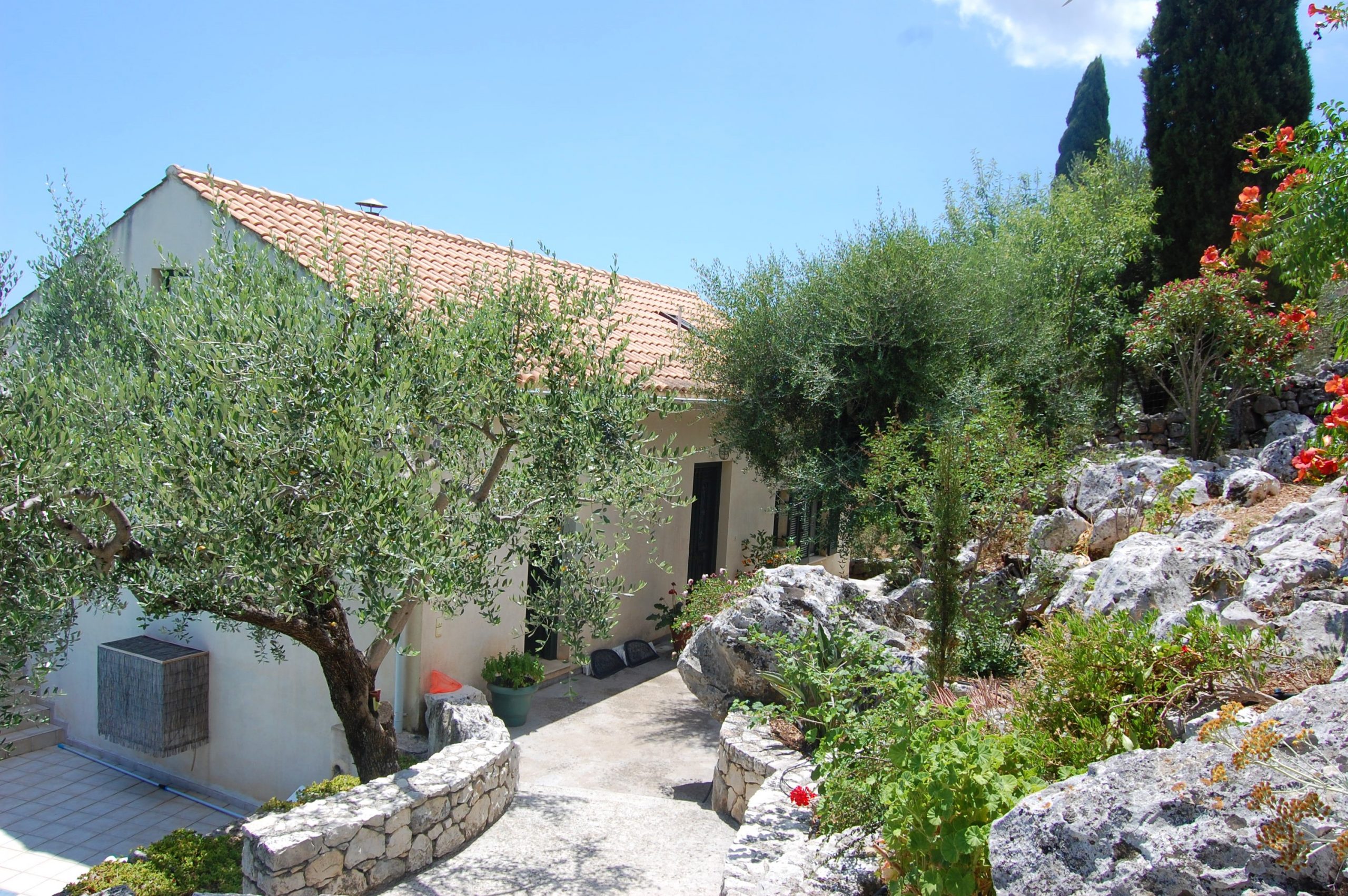 Outside area of house with pool for sale in Ithaca Greece, Perachori