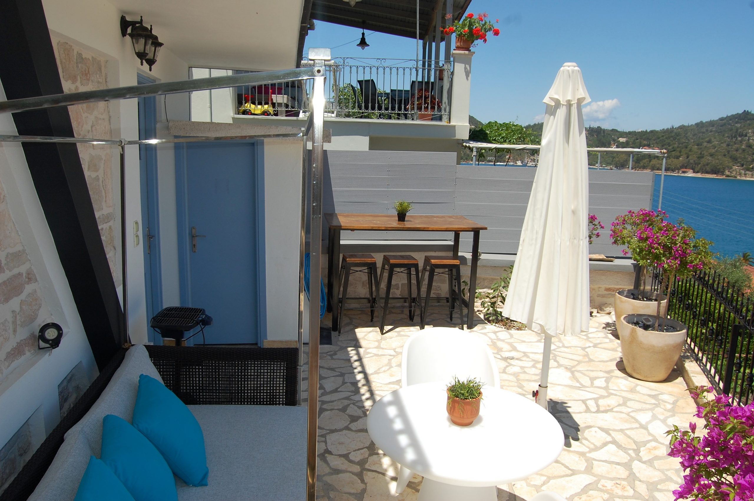 Back courtyard of Bay View house for rent in Vathi