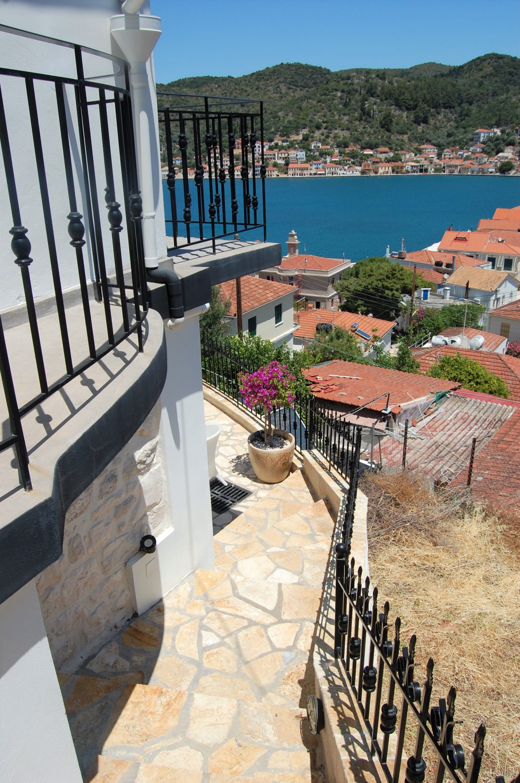 Back courtyard of Bay View house for rent in Vathi