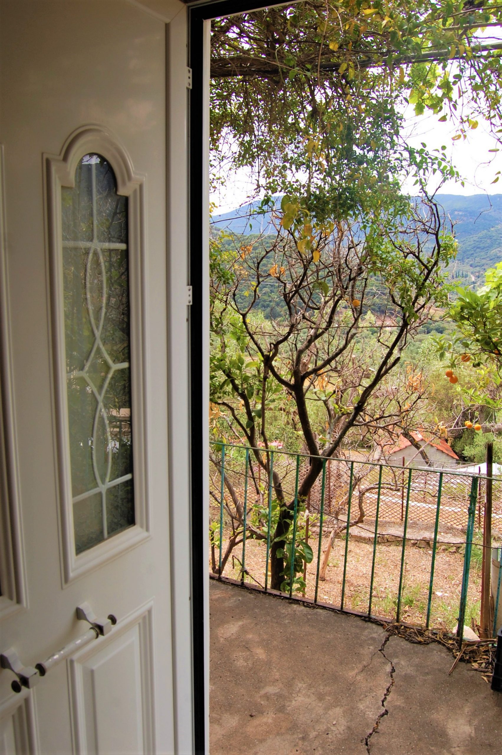 Front door of house for sale in Ithaca Greece Vathi