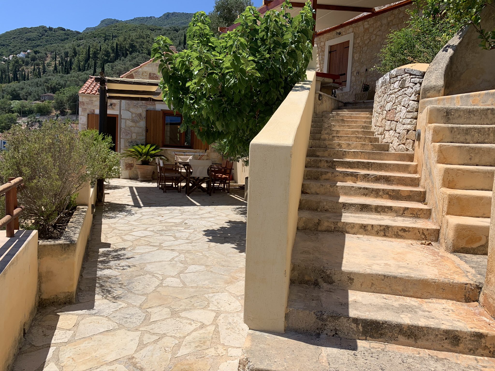 Stone terrace entrance of a rental property in Ithaca Greece