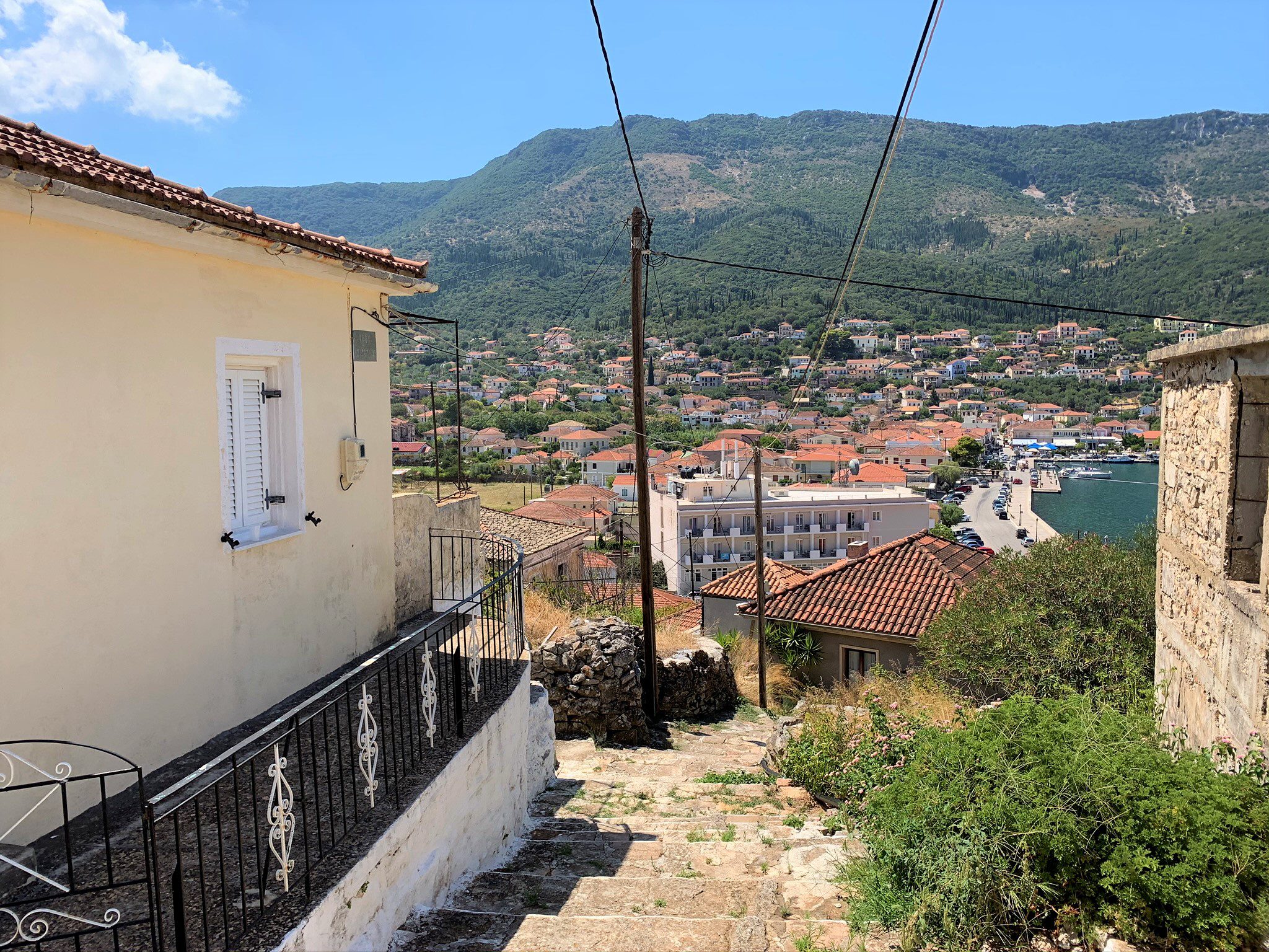 Exterior facade and footpath of house for sale in Ithaca Greece, Vathi
