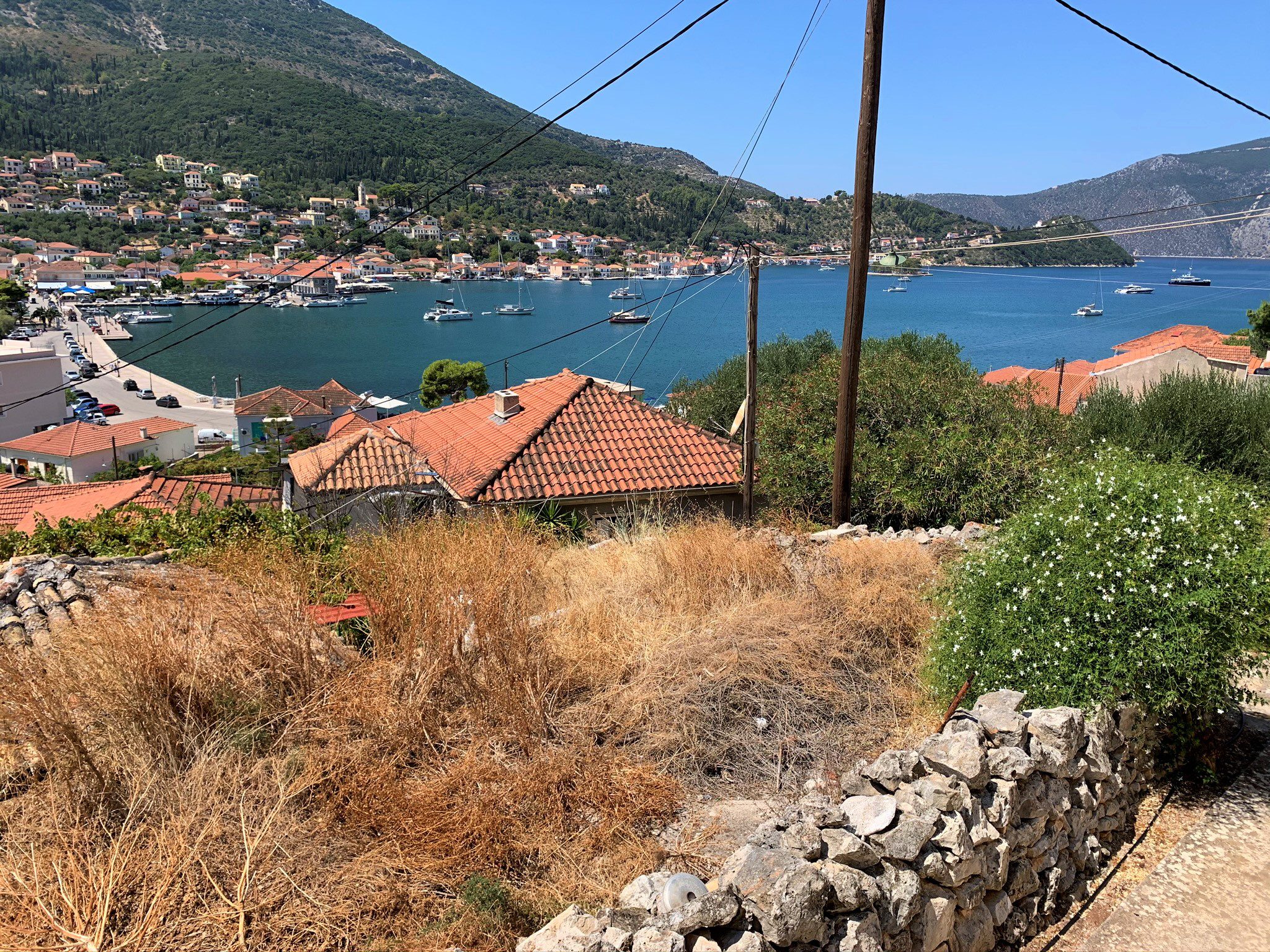 Sea view and front garden of house for sale in Ithaca Greece, Vathi