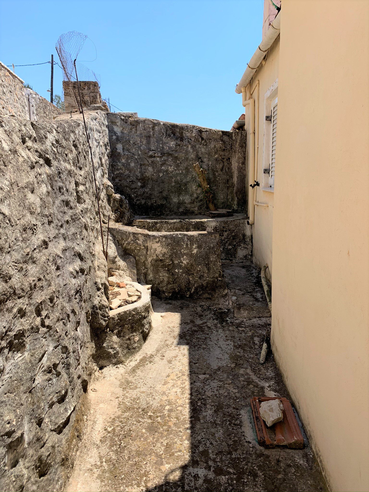 Exterior facade of house for sale in Ithaca Greece, Vathi