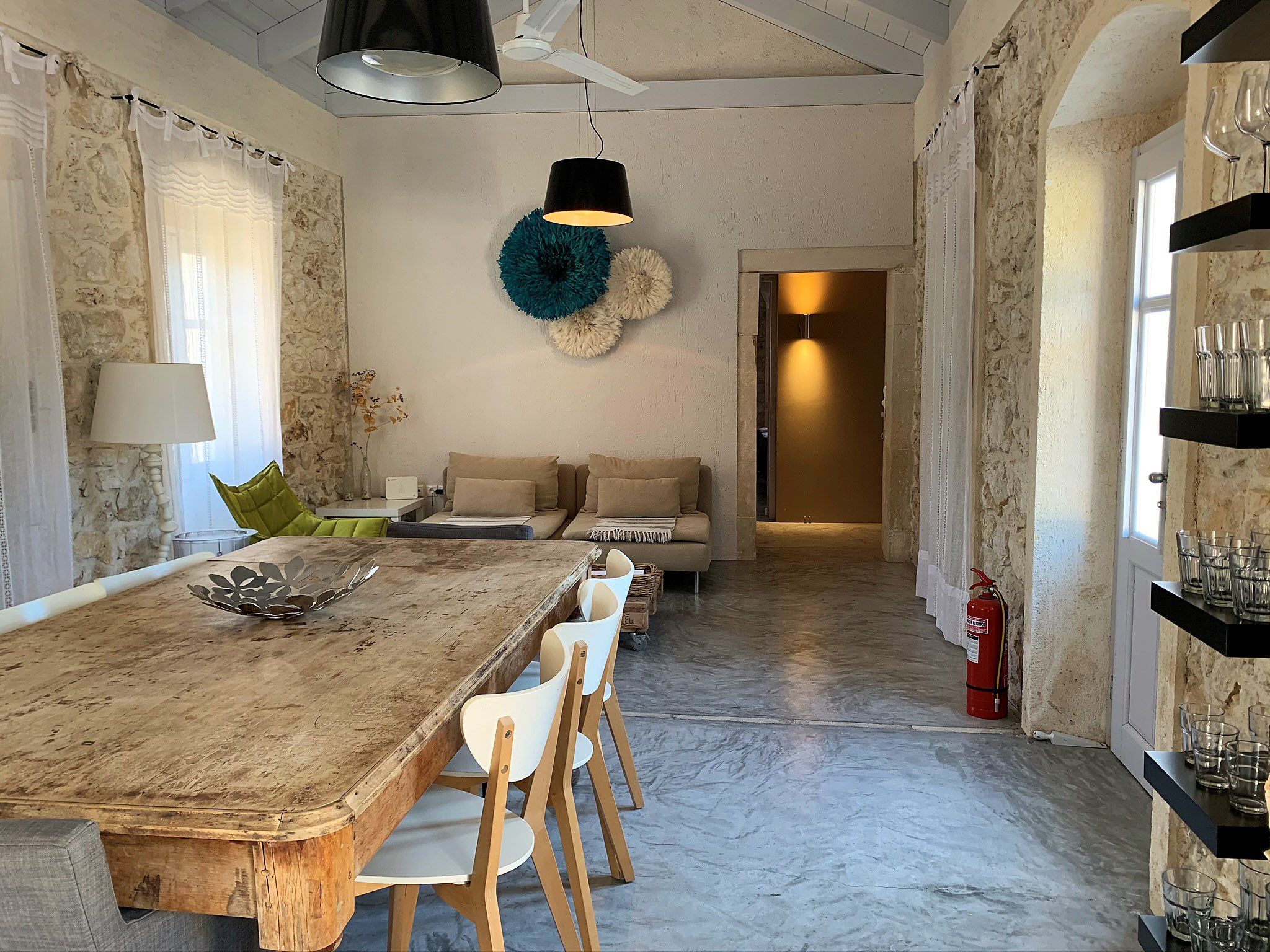 Open plan kitchen and dining area at Villa Kalos for rent, Ithaca Greece Lahos