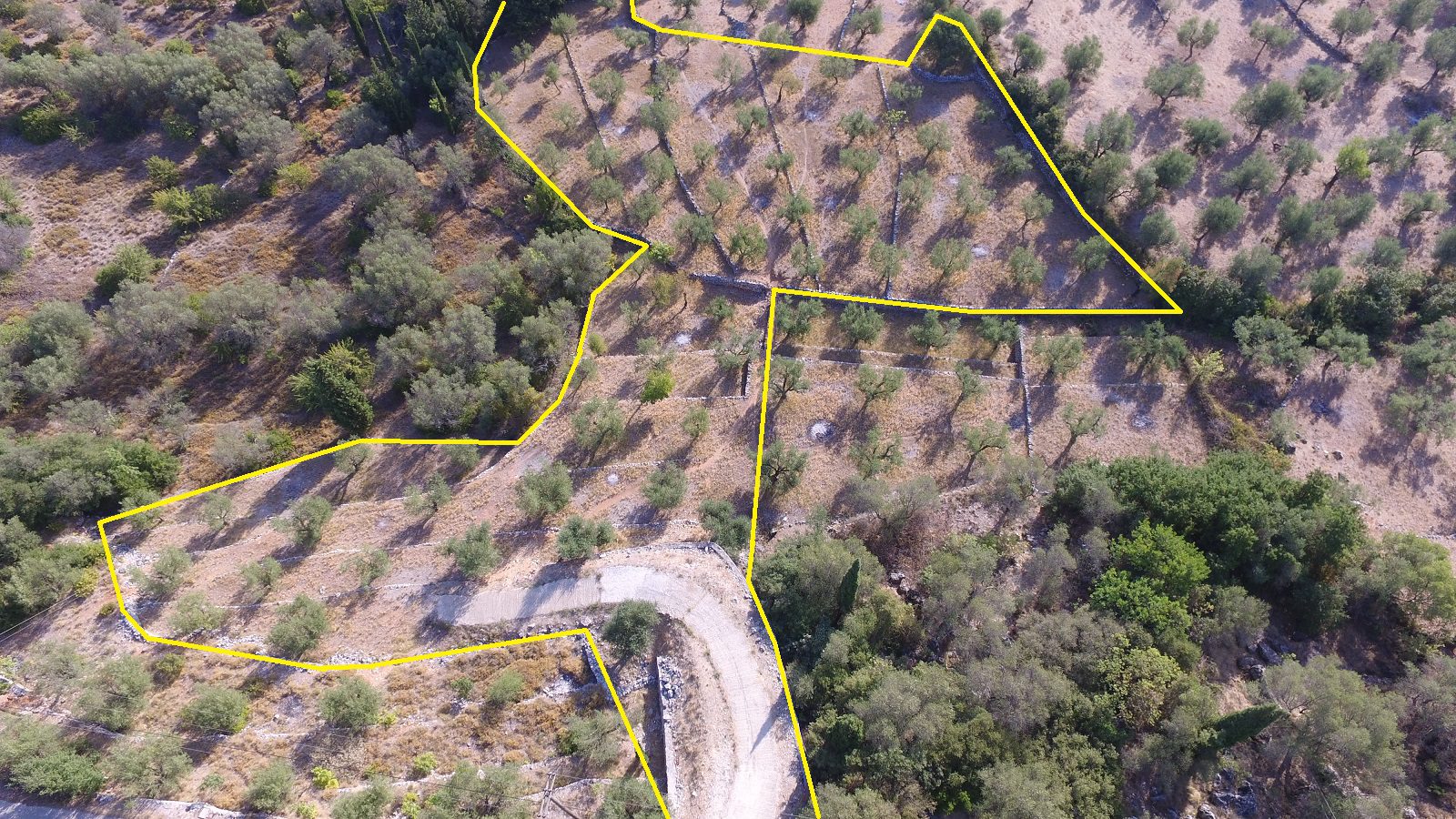 Aerial view with border of land for sale Ithaca Greece in Vathi