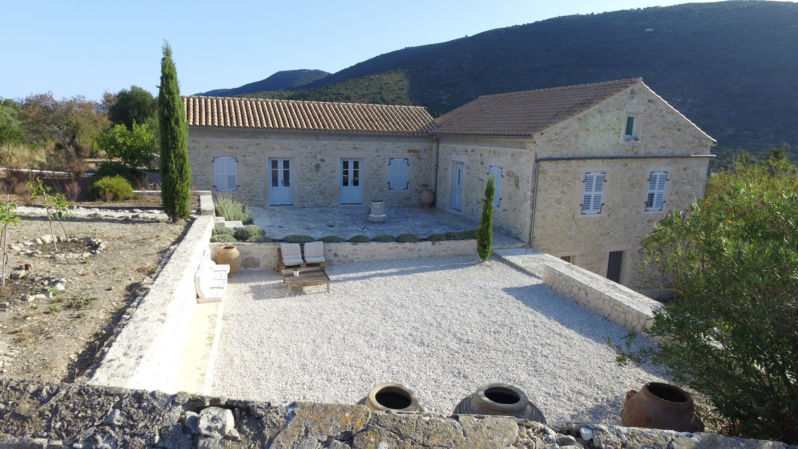 Aerial view of stone built Villa Kalos for rent, Ithaca Greece Lahos
