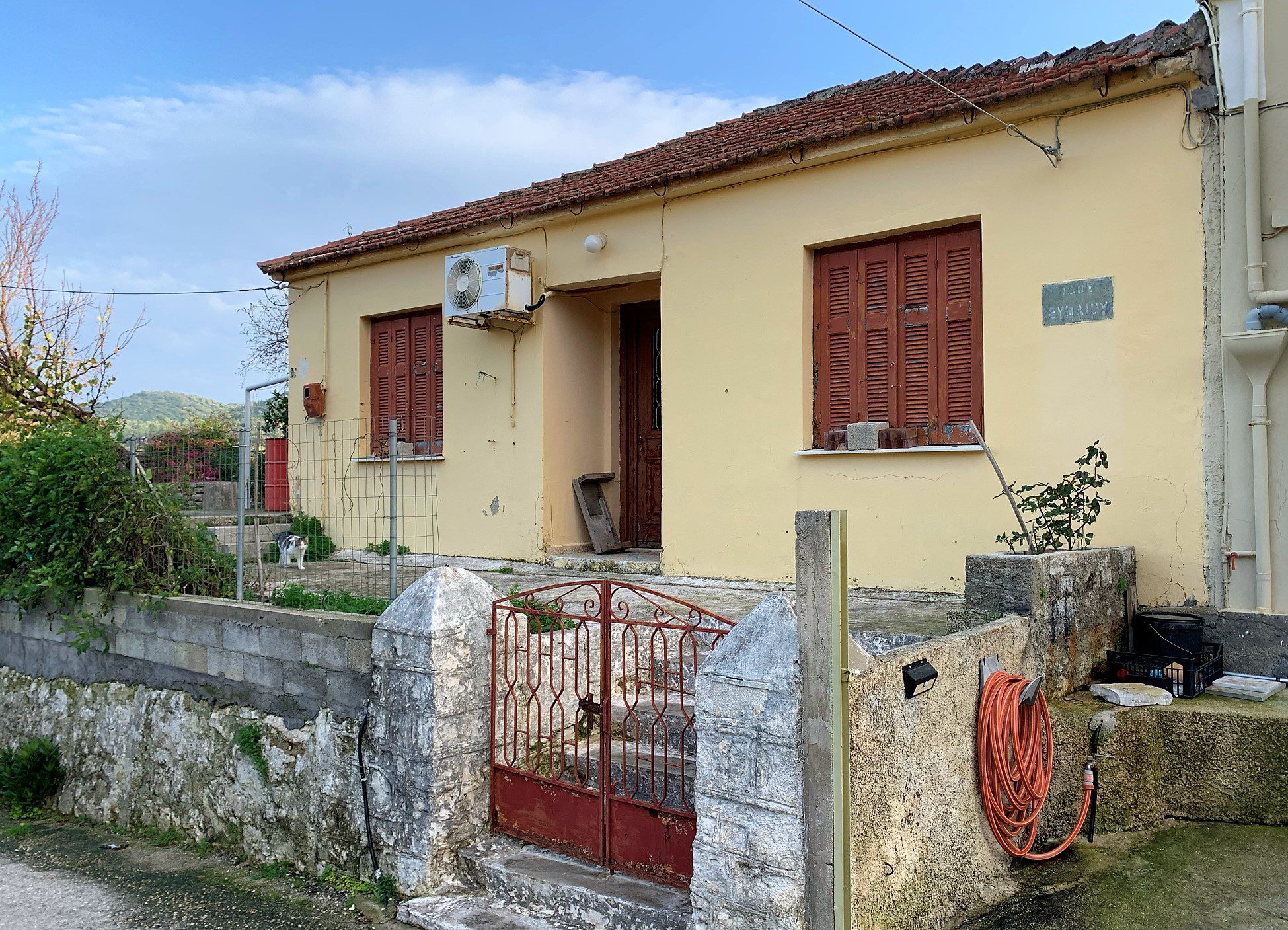 Exterior facade of house for sale in Ithaca Greece, Vathi