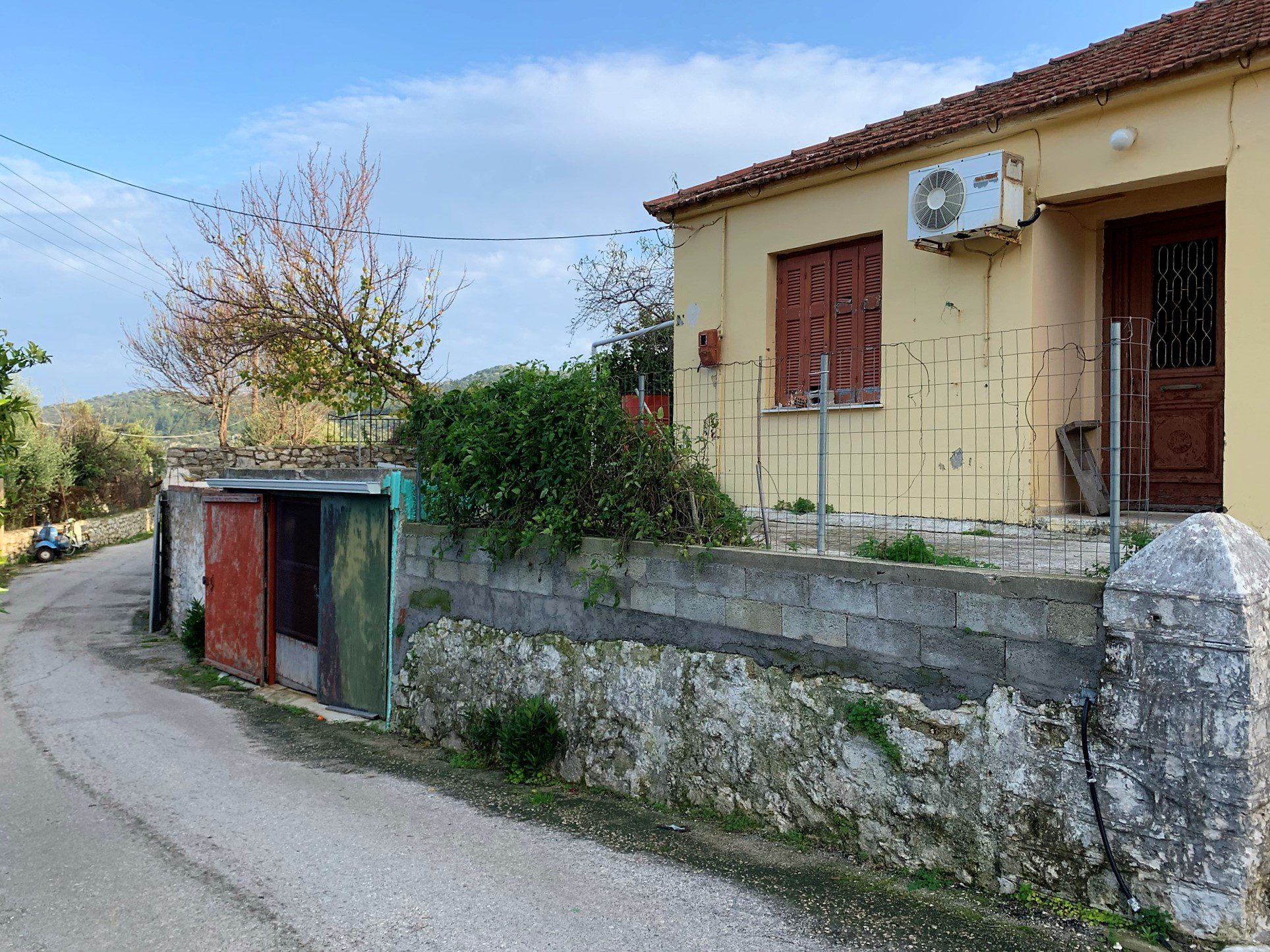 Exterior facade of house for sale in Ithaca Greece, Vathi