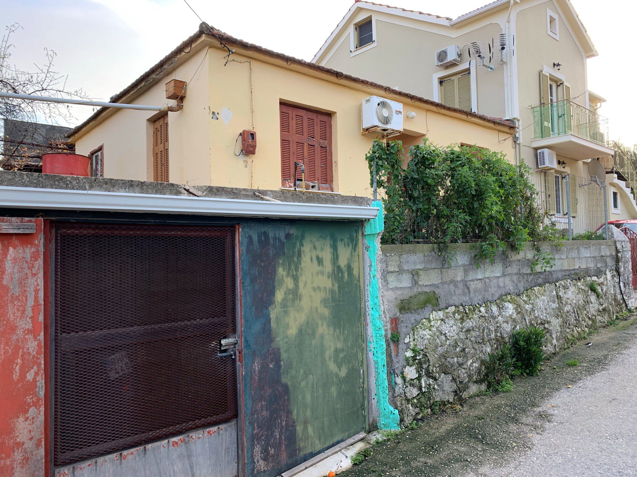 Exterior facade of house for sale in Ithaca Greece, Vathi