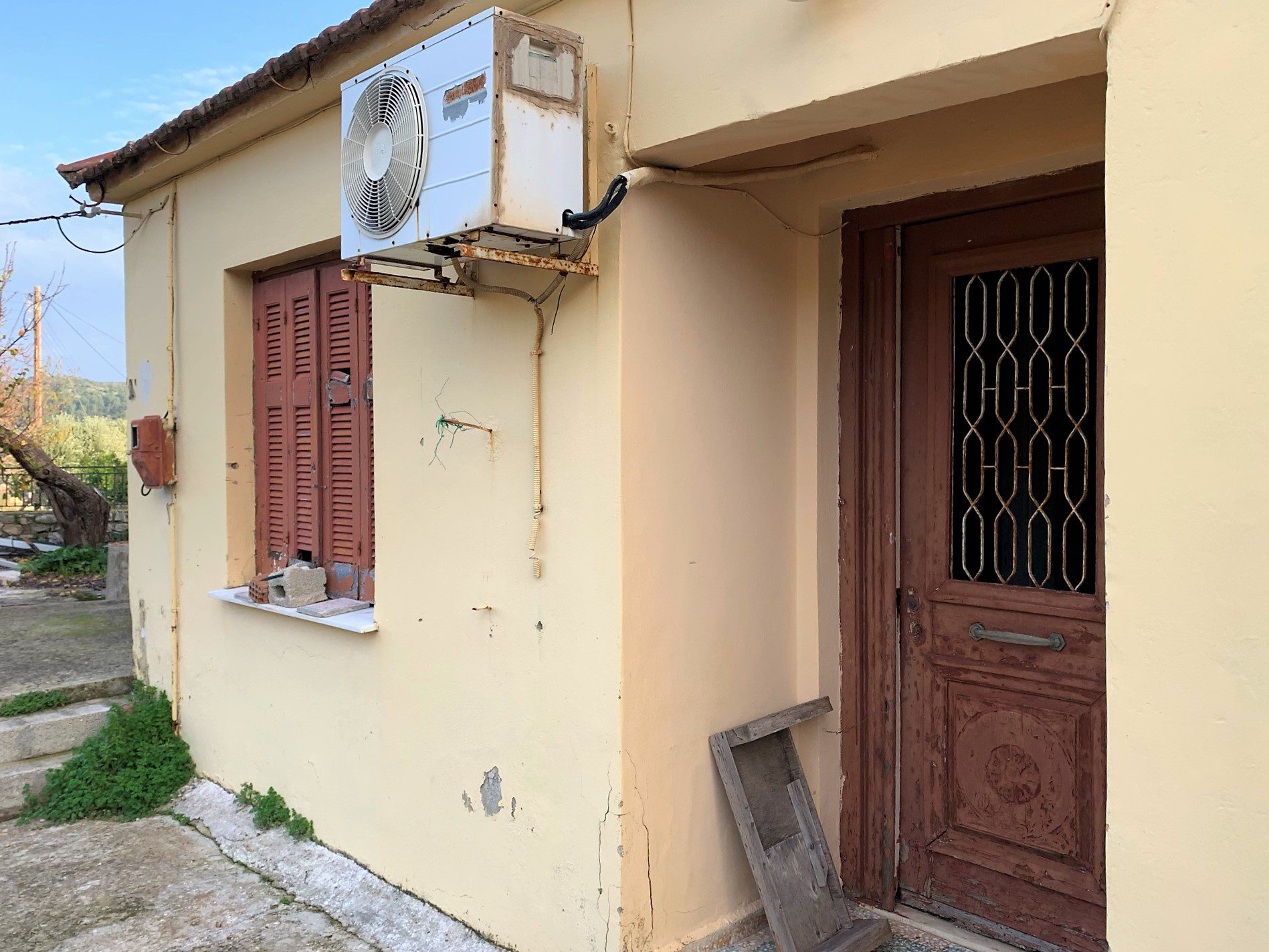 Exterior facade of house for sale in Ithaca Greece, Vathi