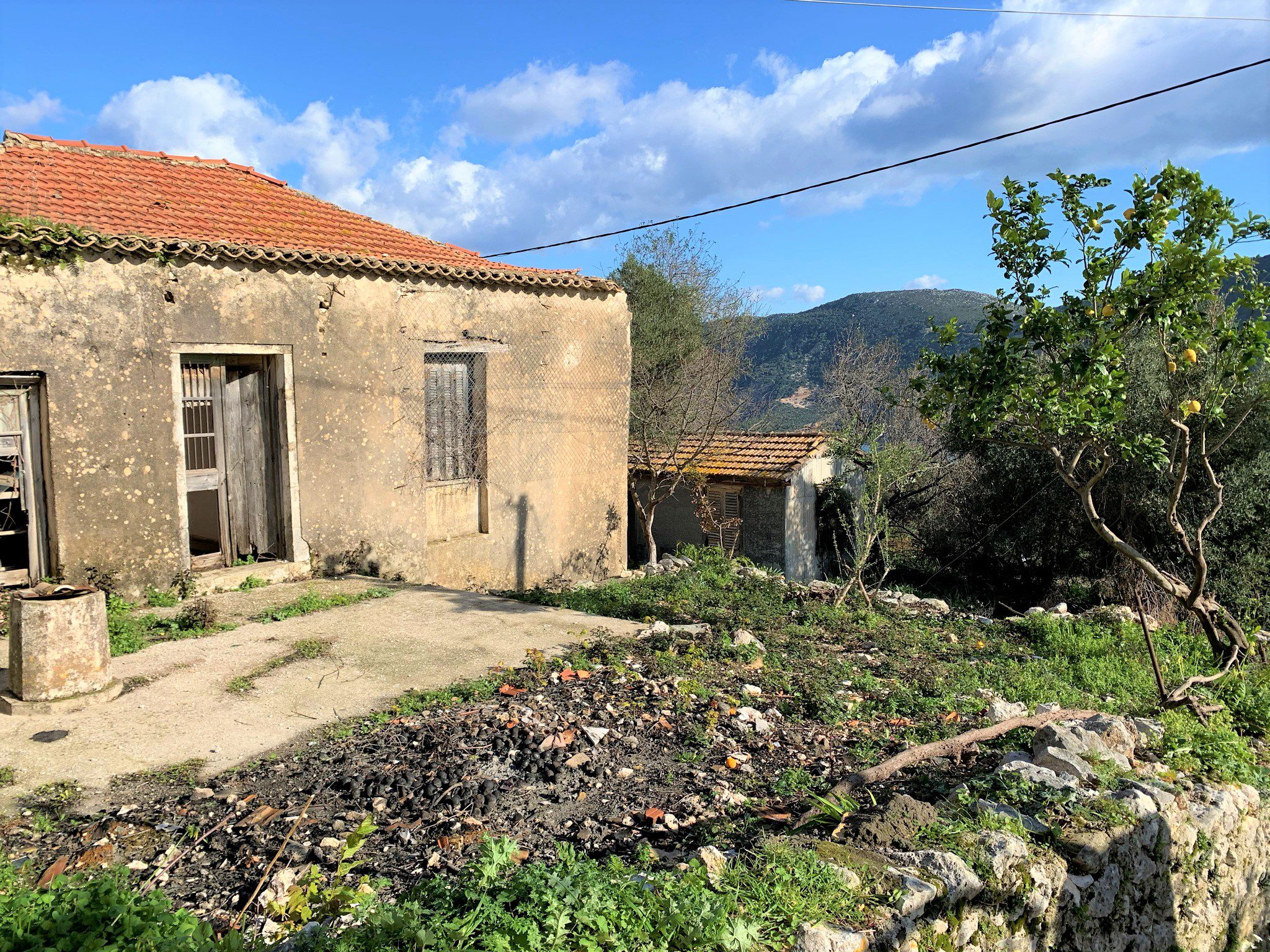 Outside walls and areas of house for sale in Ithaca Greece Kolleri