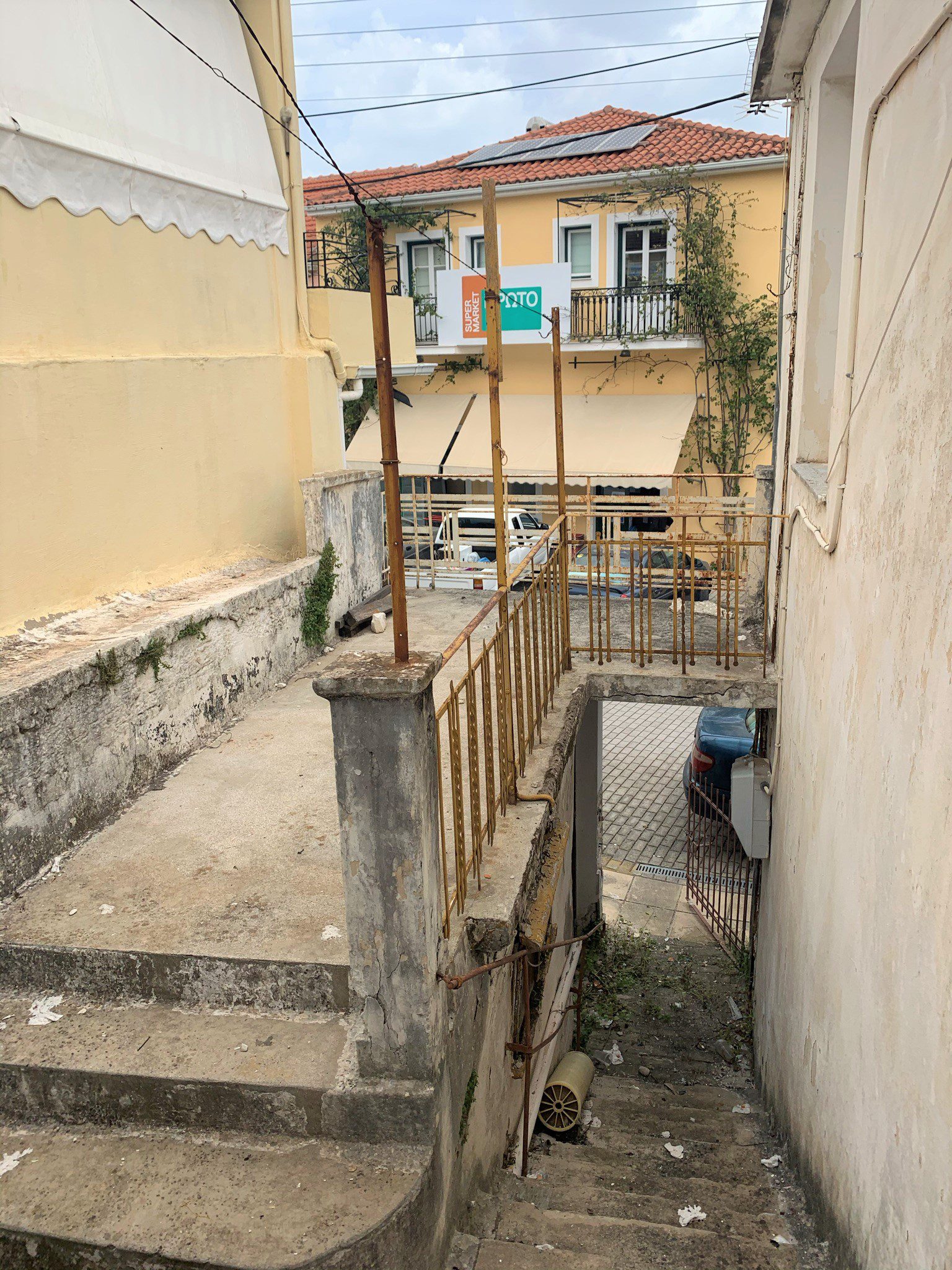 Outside staircase of house for sale in Ithaca Greece Vathi