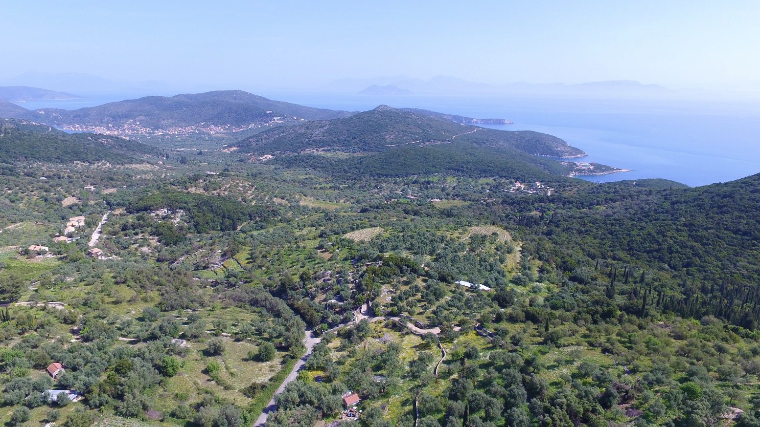 Aerial view of land with building license for sale on Ithaca Greece, Perachori