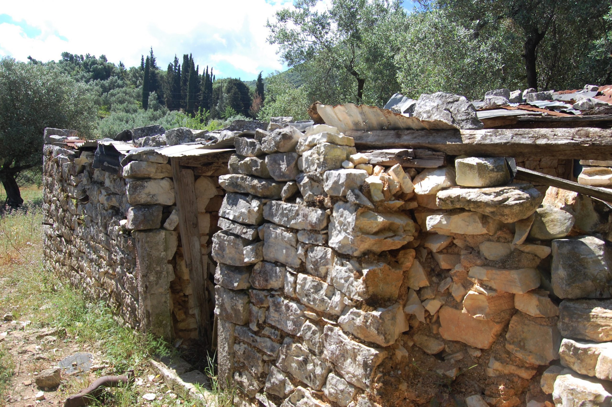 Stone water tank on land for sale in Ithaca Greece, Perachori