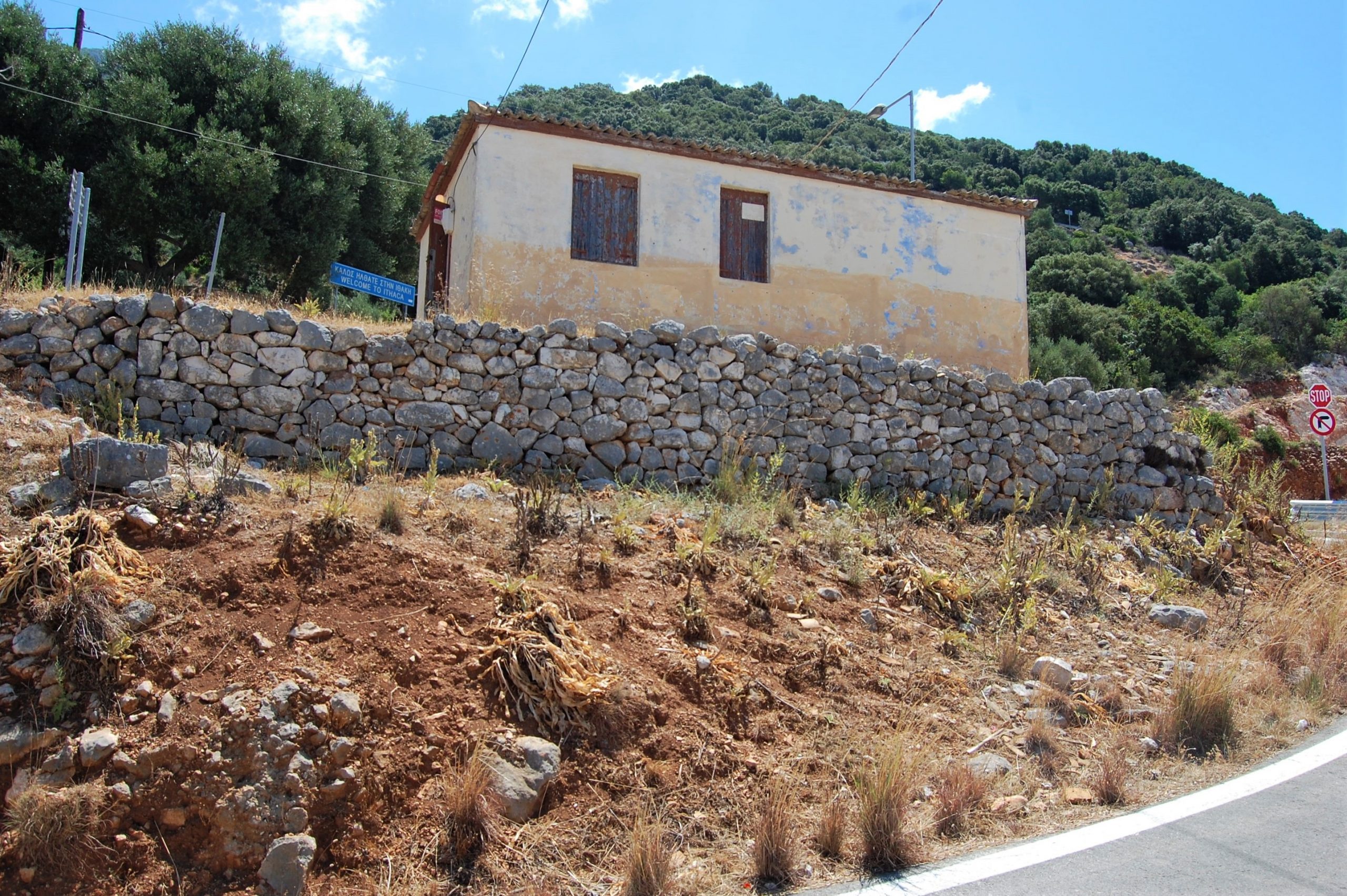 Distant view of house for sale on Ithaca Greece, Piso Aetos