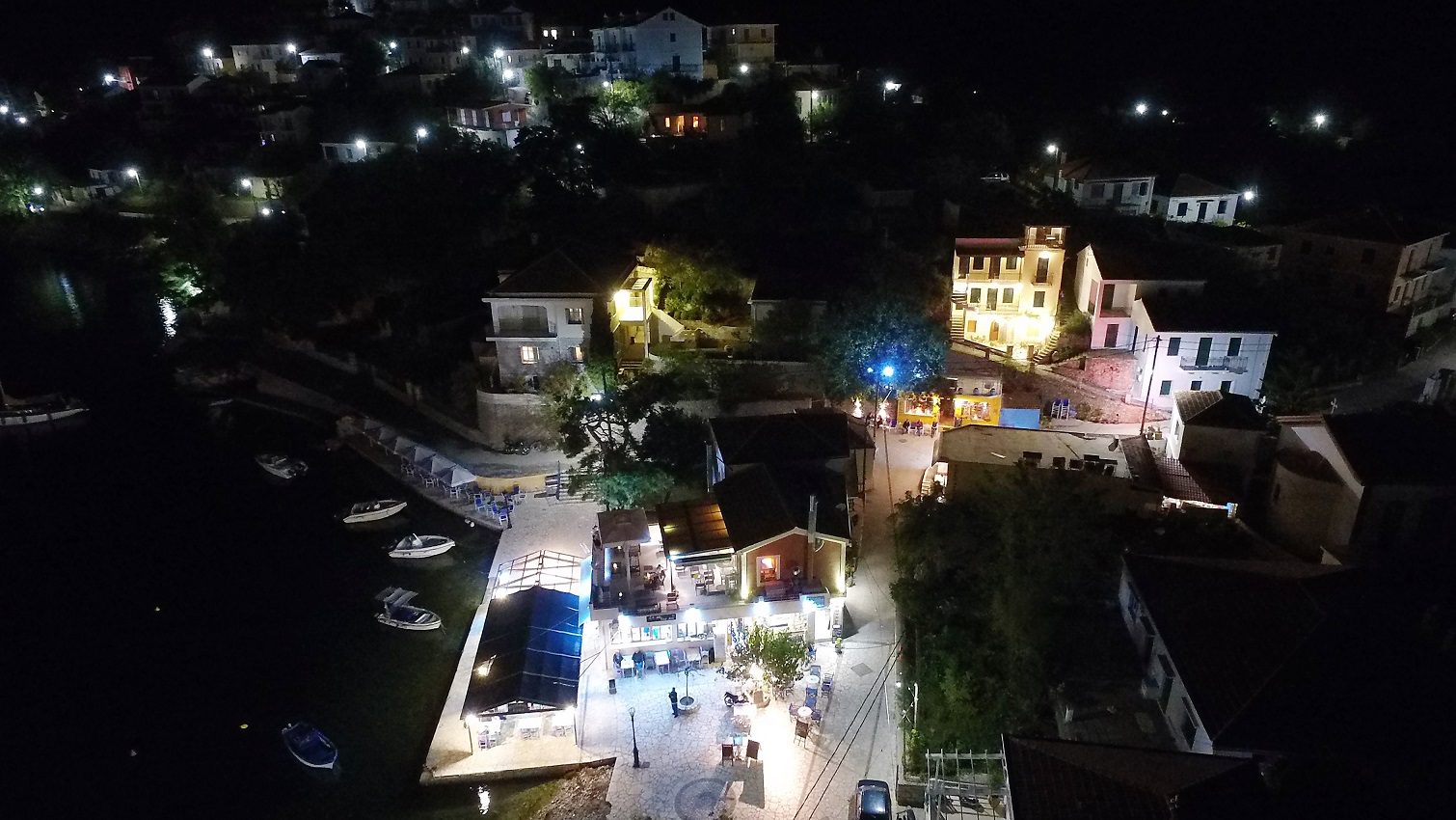Night views of apartment complex and house for sale in Ithaca Greece, Kioni