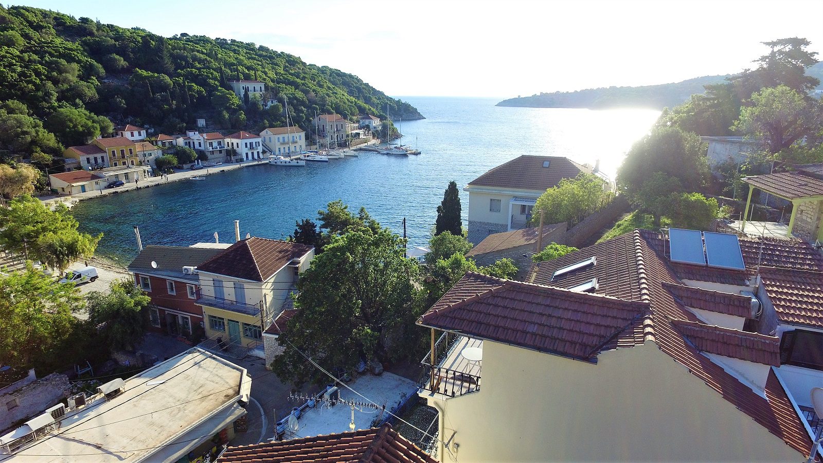 Aerial views of apartment complex and house for sale in Ithaca Greece, Kioni