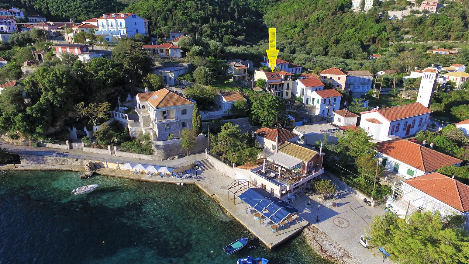 Aerial views of apartment complex and house for sale in Ithaca Greece, Kioni