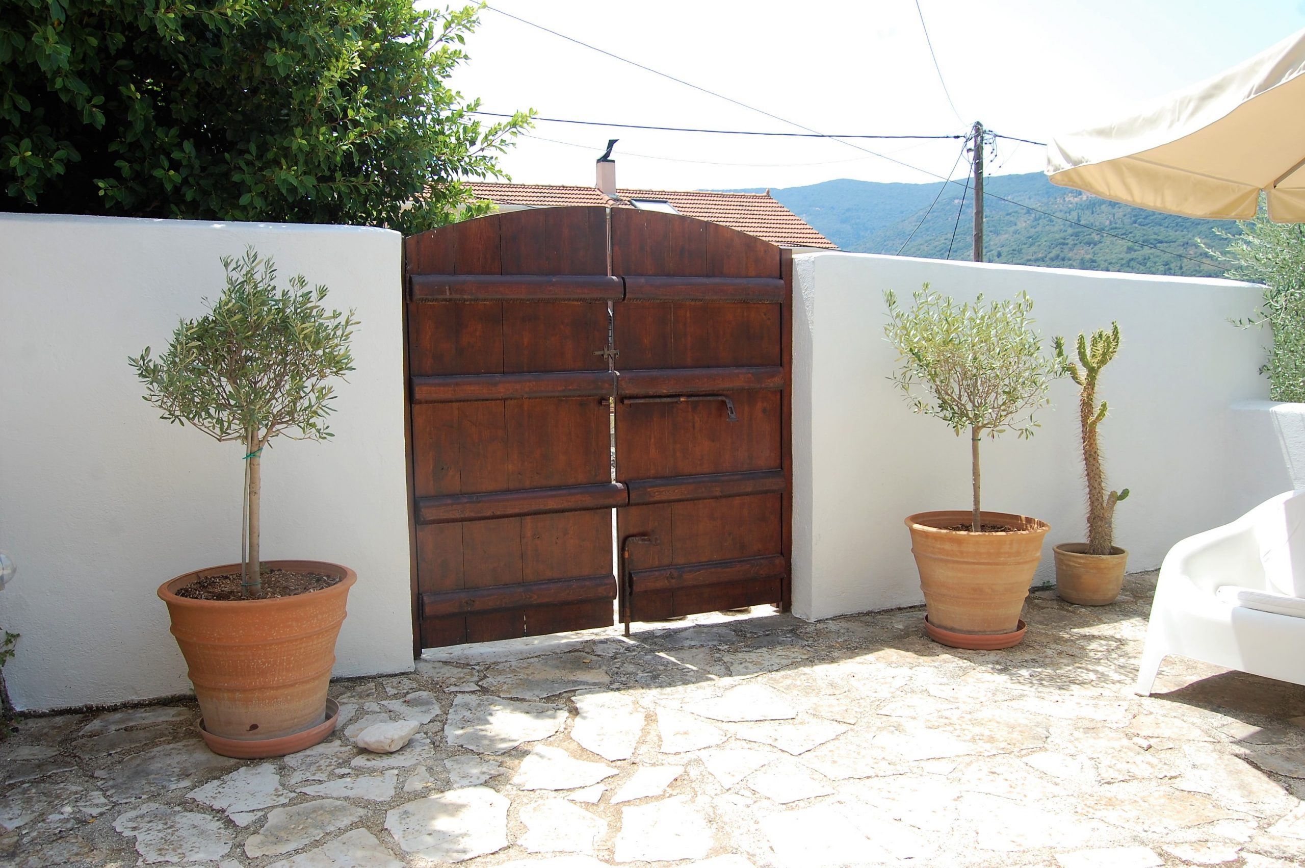Gated entrance of house for sale in Ithaca Greece, Vathi