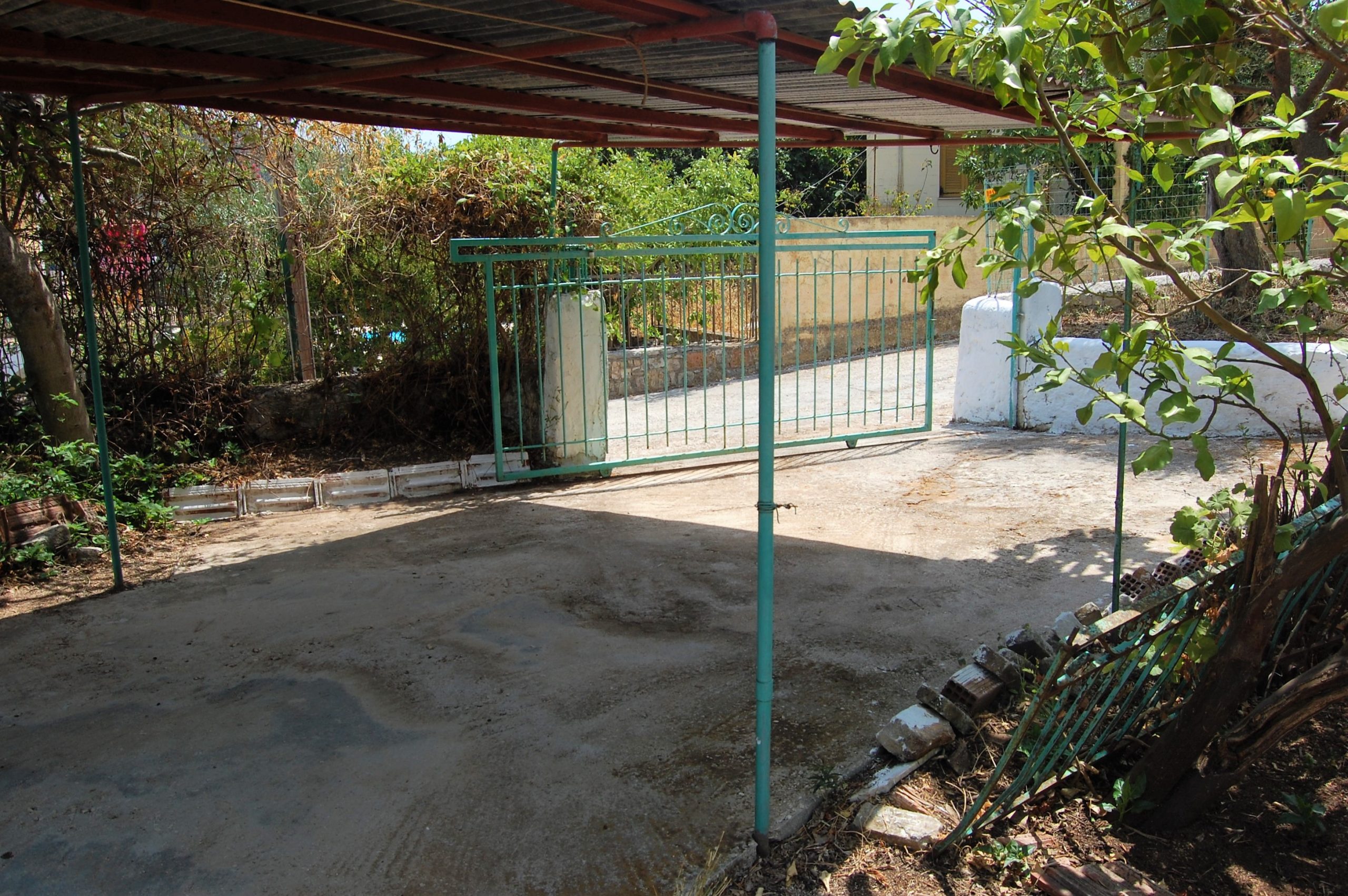 Gated entrance of house for sale in Ithaca Greece, Vathi