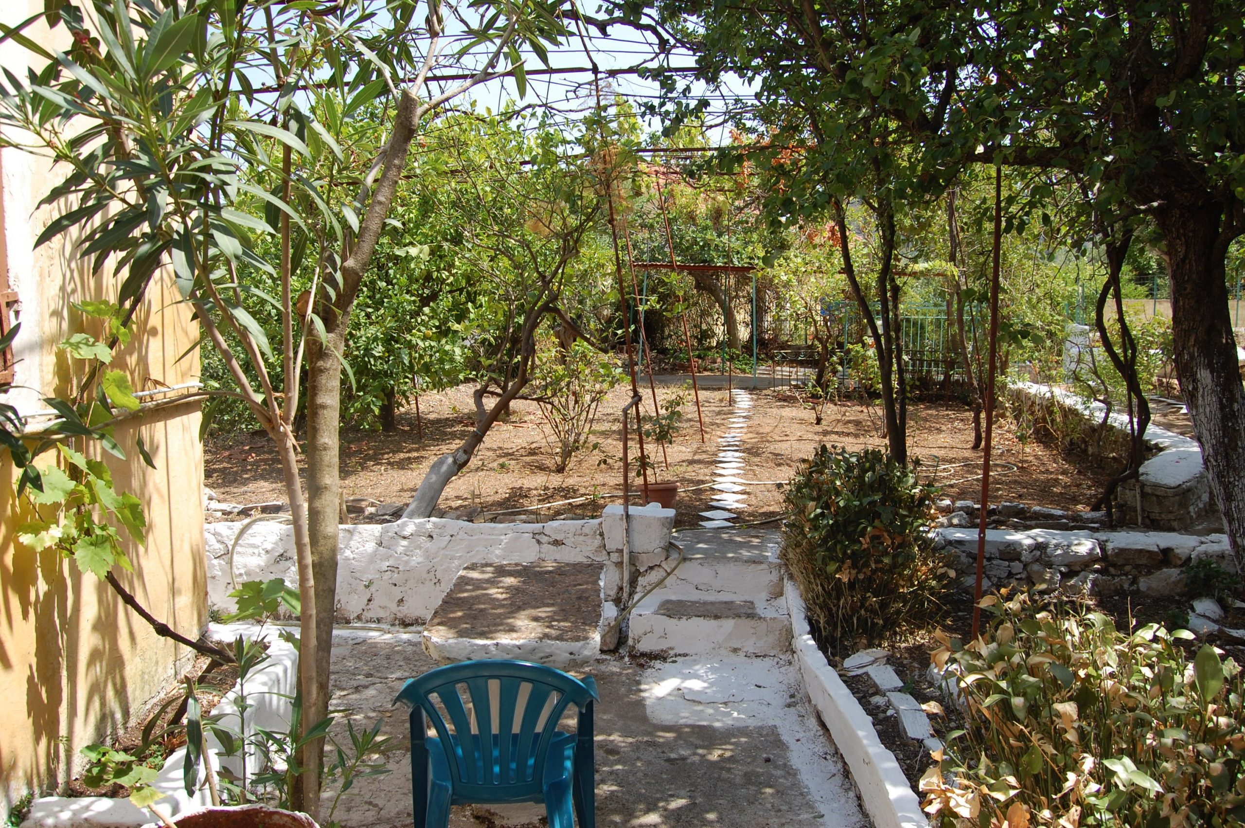 Garden of house for sale in Ithaca Greece, Vathi