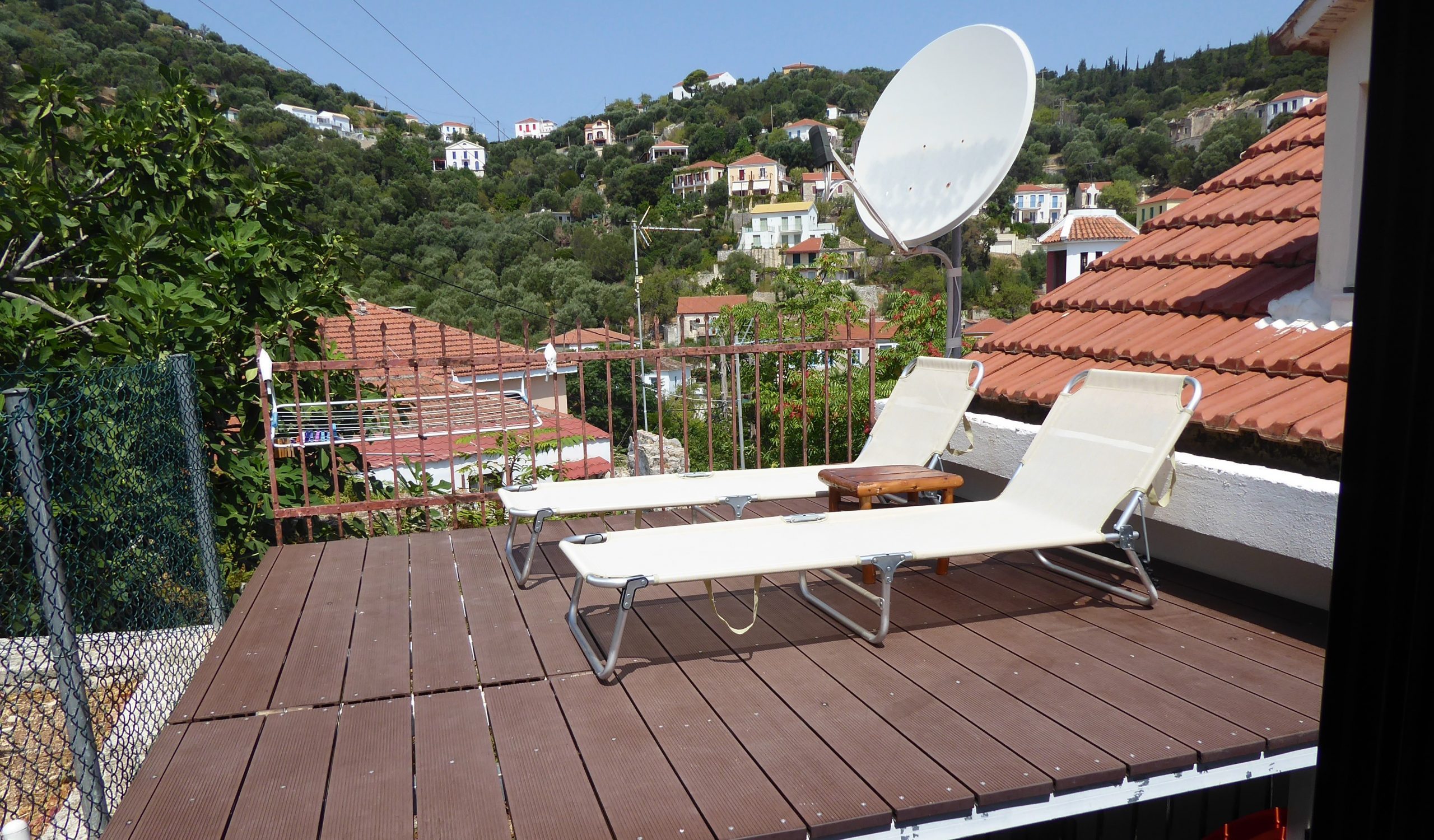 Wooden terrace of apartments for sale in Ithaca Greece, Kioni