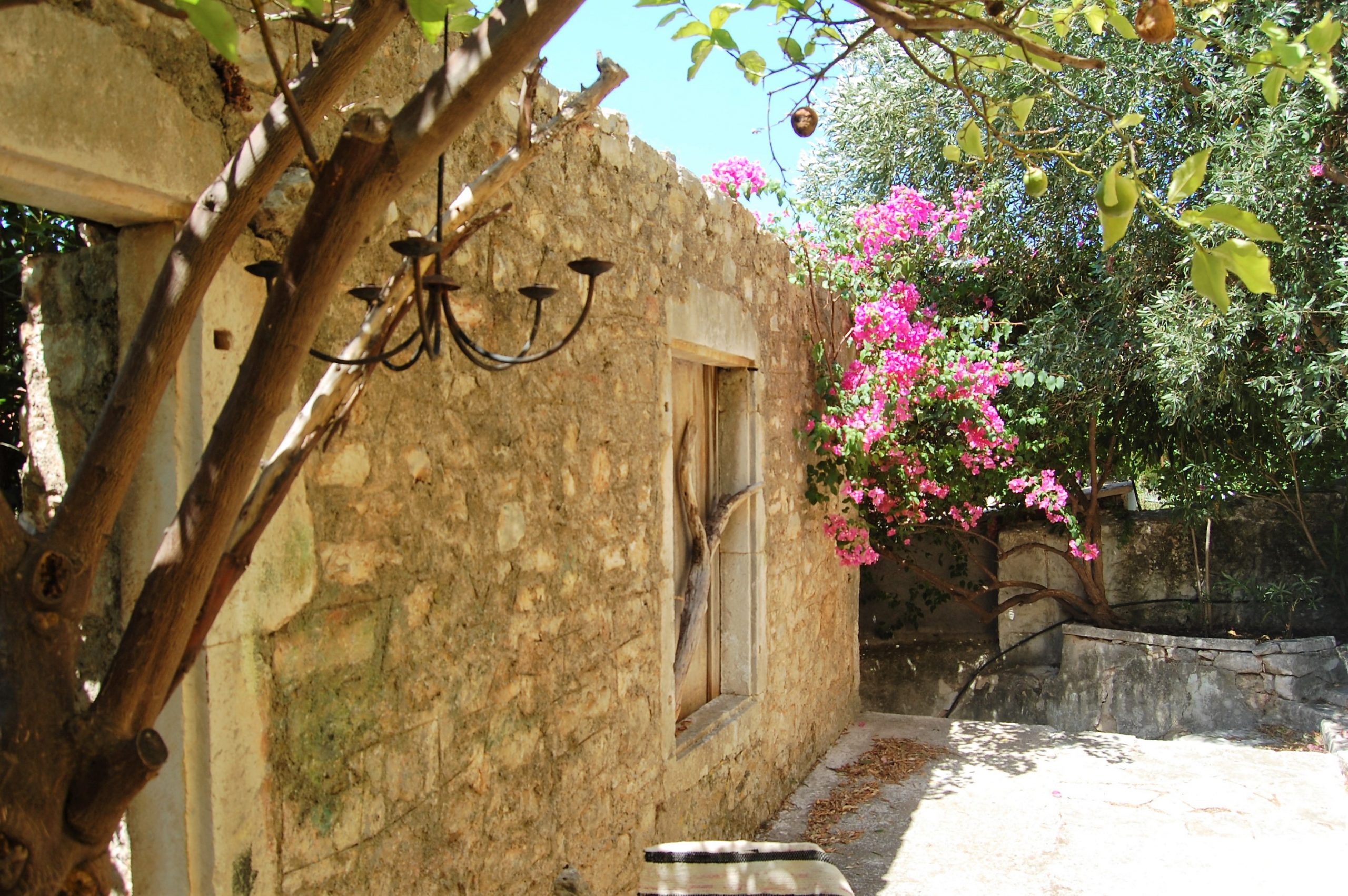 Exterior facade and terrace of ruin for sale in Ithaca Greece, Vathi
